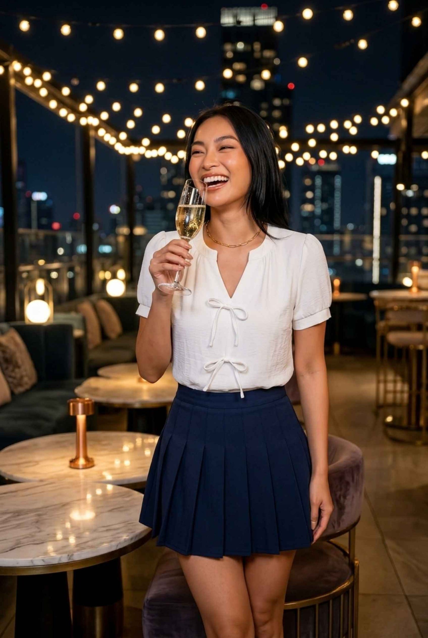 Virtual Model Wearing The Blythe Pleated Mini Skirt Navy High-Waisted Pleated Tennis Mini Skirt