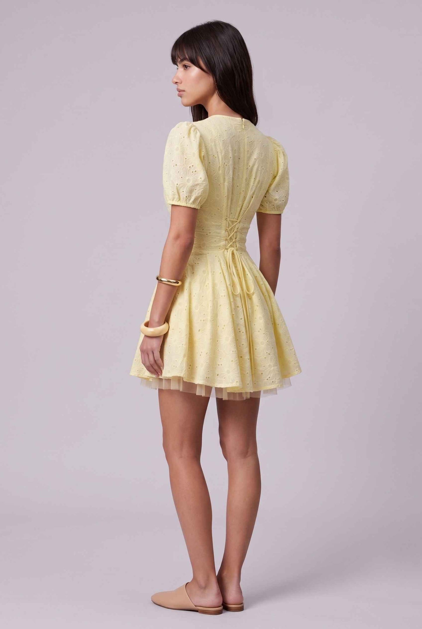 Virtual Model wearing The Capri Eyelet Mini Yellow Cotton Puff Sleeve Mini Dress
