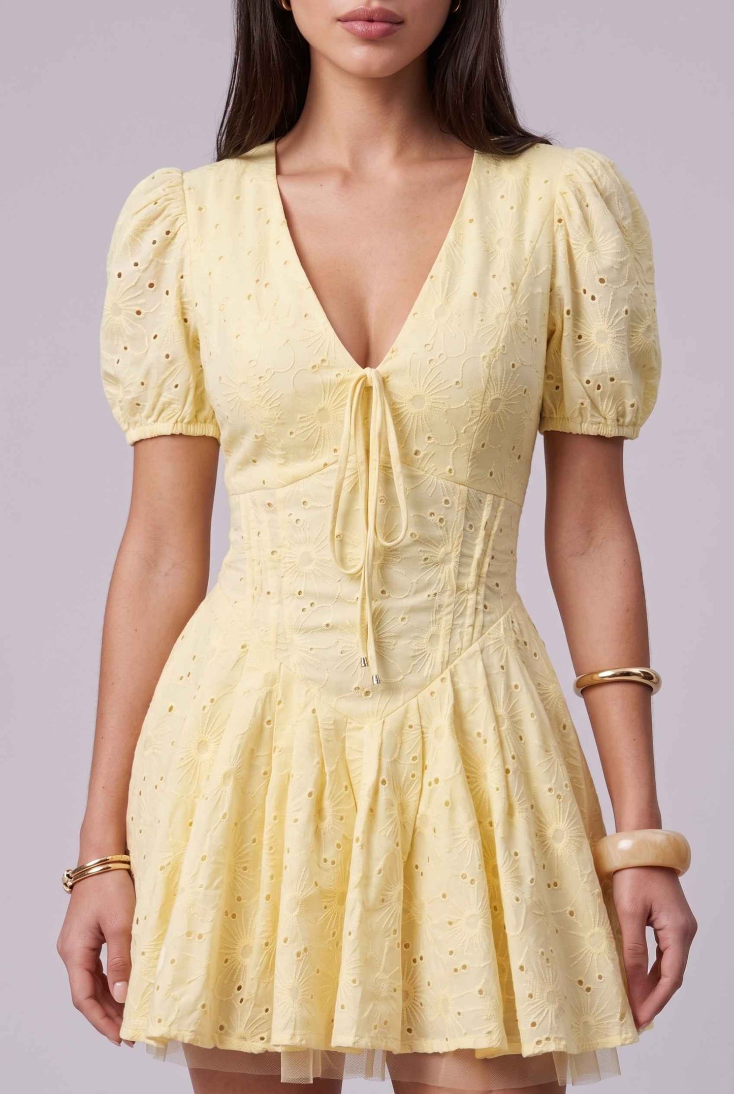 Virtual Model wearing The Capri Eyelet Mini Yellow Cotton Puff Sleeve Mini Dress