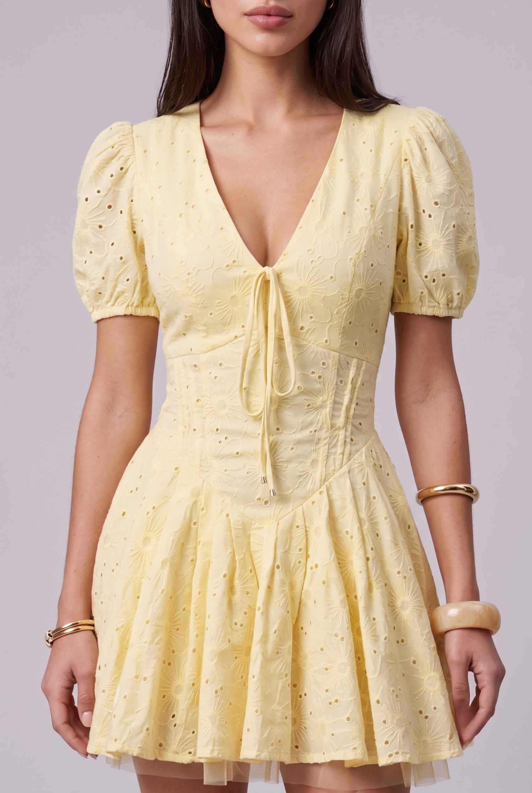 Virtual Model wearing The Capri Eyelet Mini Yellow Cotton Puff Sleeve Mini Dress