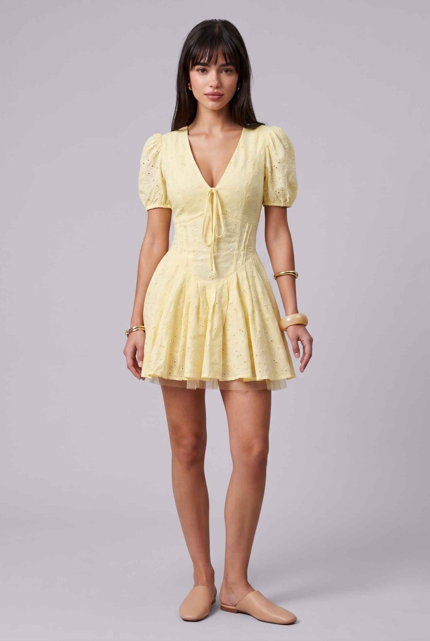 Virtual Model wearing The Capri Eyelet Mini Yellow Cotton Puff Sleeve Mini Dress