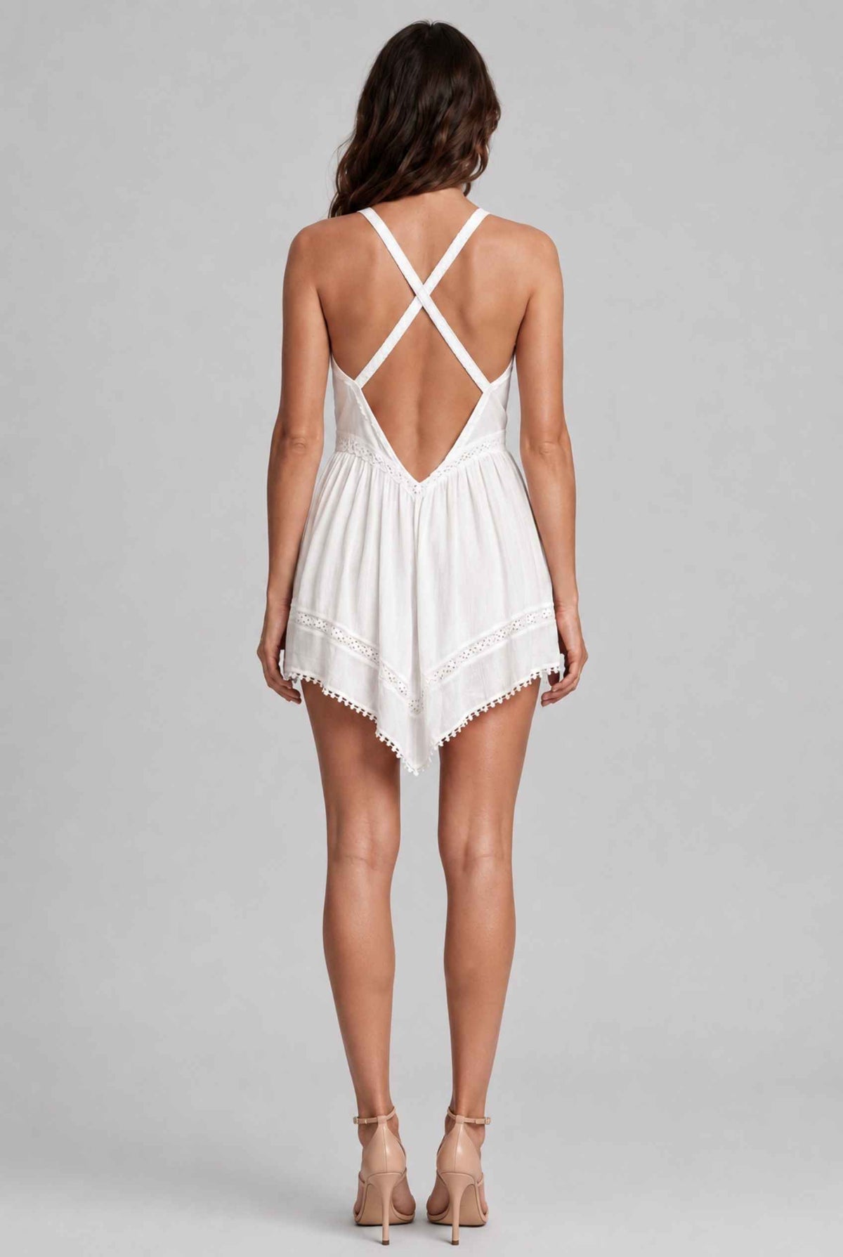 Virtual model wearing The Clara Embroidered Mini White Lace Handkerchief Mini Dress
