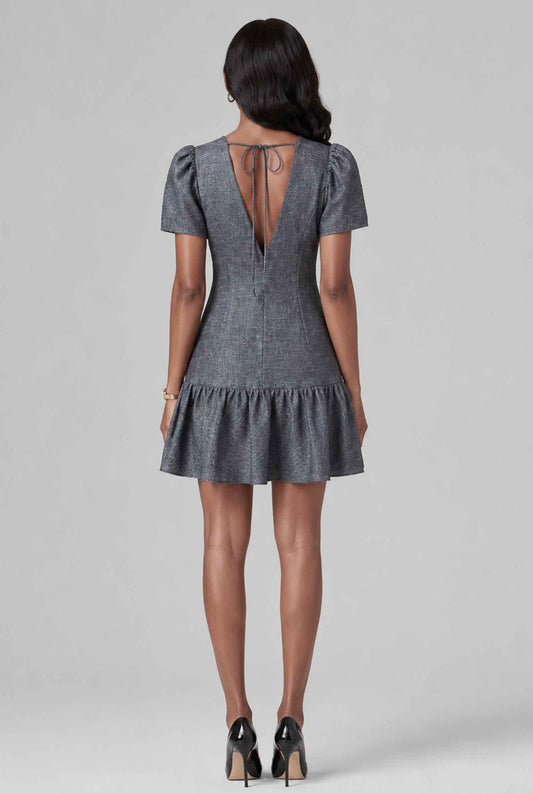 Virtual model wearing The Colette Chambray Mini Puff-Sleeve Drop-Waist Chambray Dress in Dark Gray