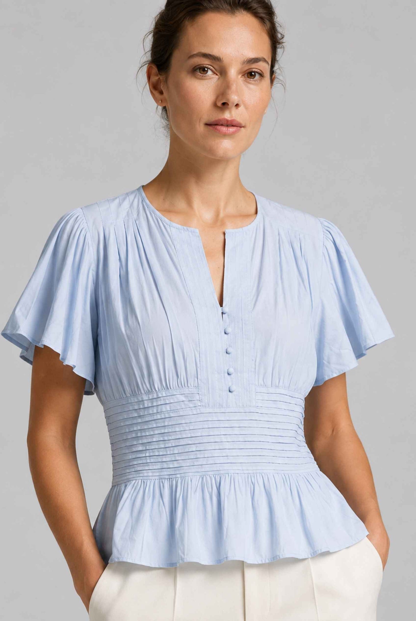 Virtual Model wearing The Colette Pintuck Blouse Pleated Flutter Blue Sleeve Blouse