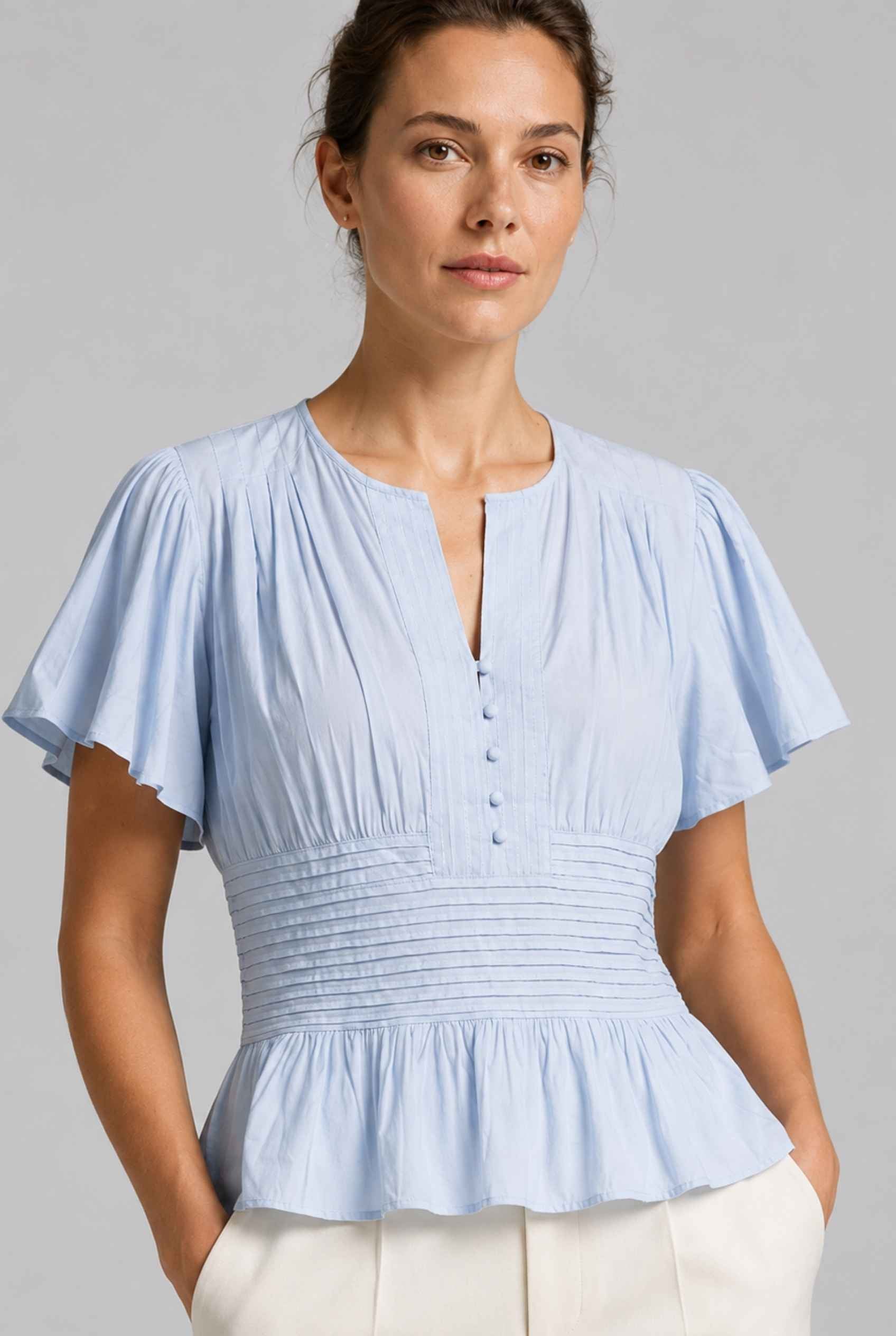 Virtual Model wearing The Colette Pintuck Blouse Pleated Flutter Blue Sleeve Blouse