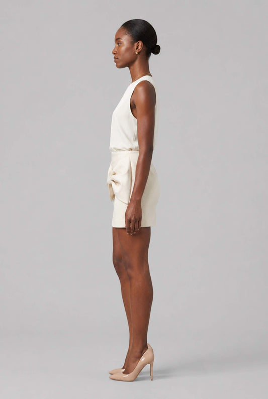 Virtual Model wearing The Cordelia Bow Skirt Taffeta Cream Mini Skirt