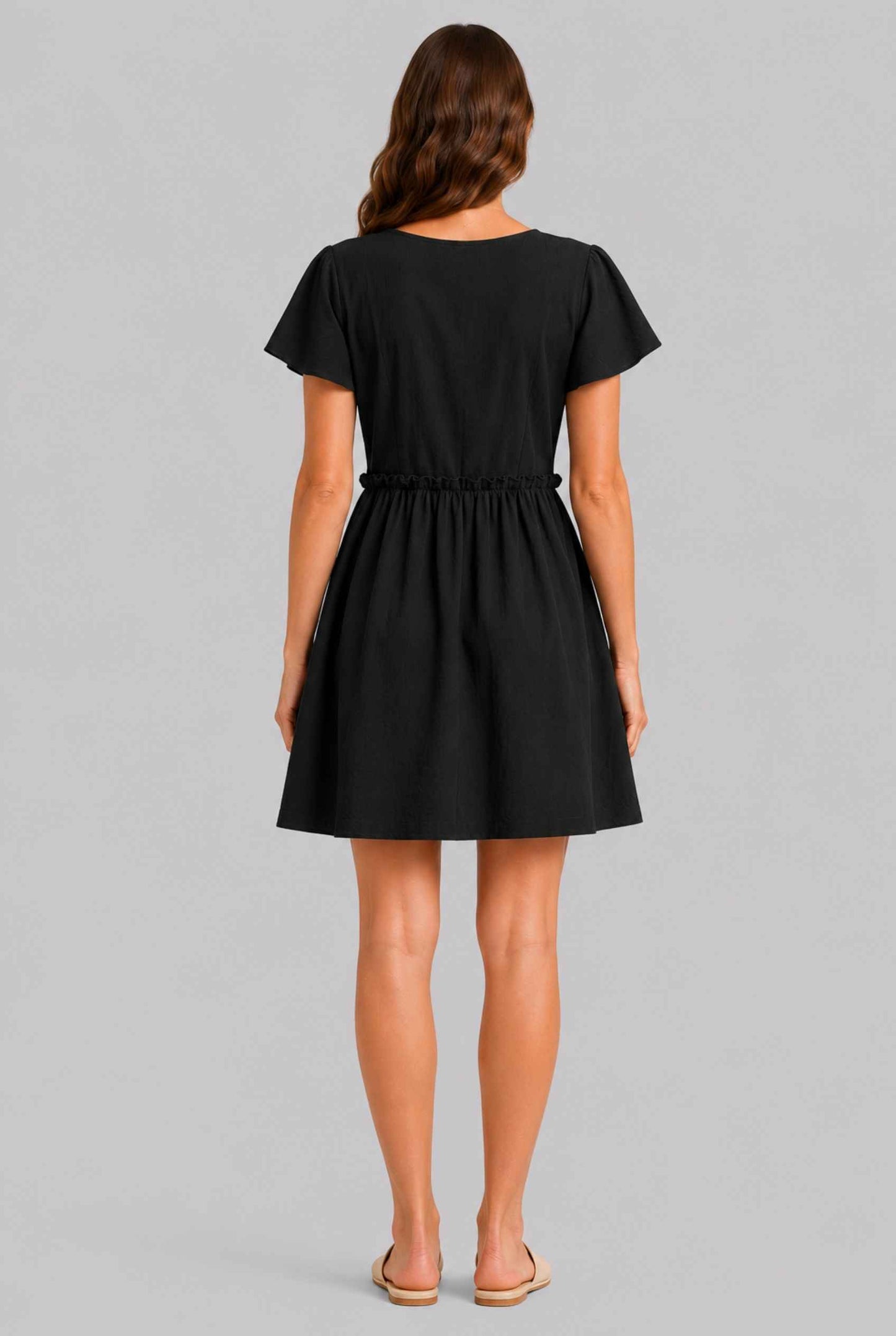 Virtual Model wearing The Delia Buttoned Mini Black Flutter Sleeve Ruffled Dress