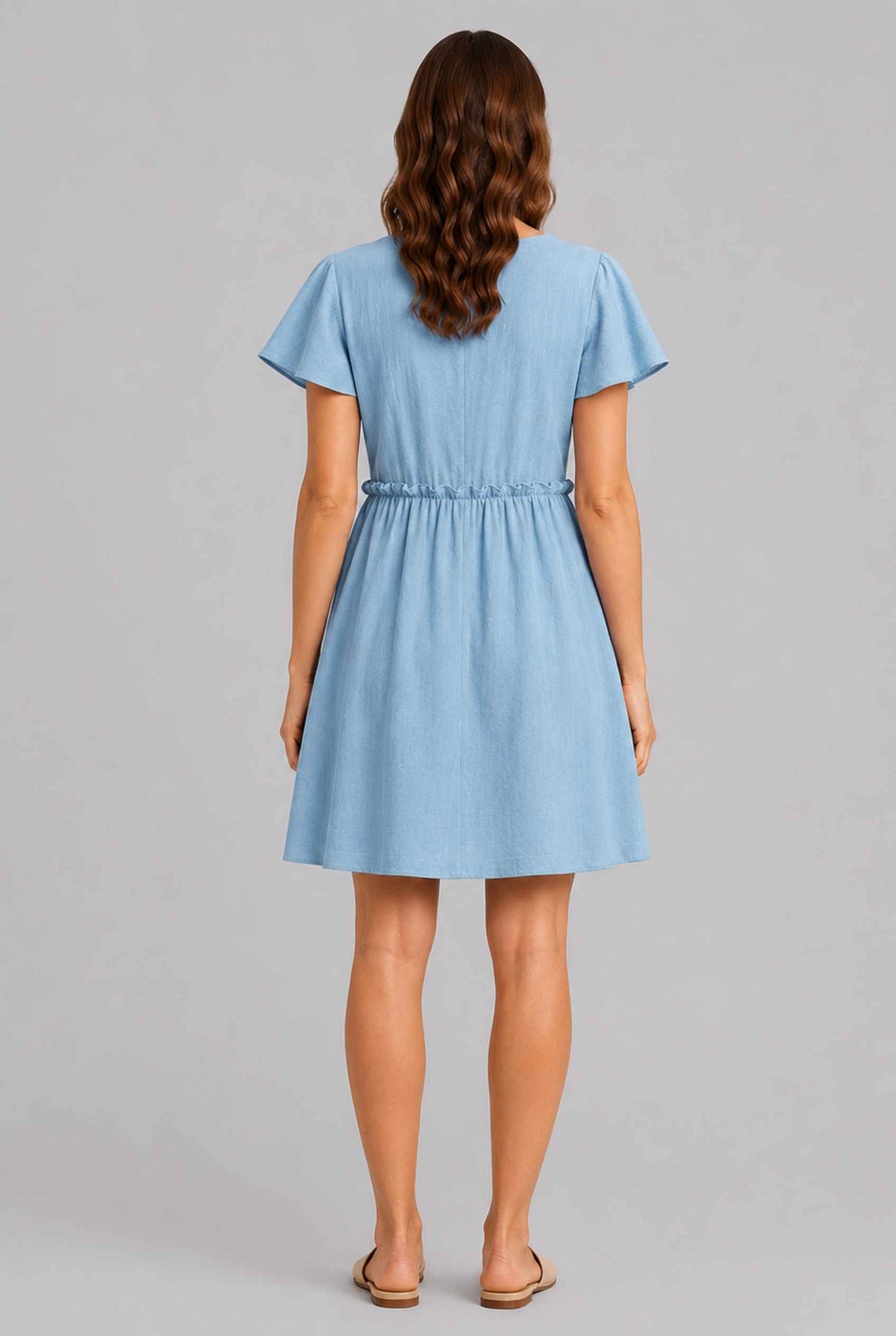 Virtual Model wearing The Delia Buttoned Mini Blue Flutter Sleeve Ruffled Dress