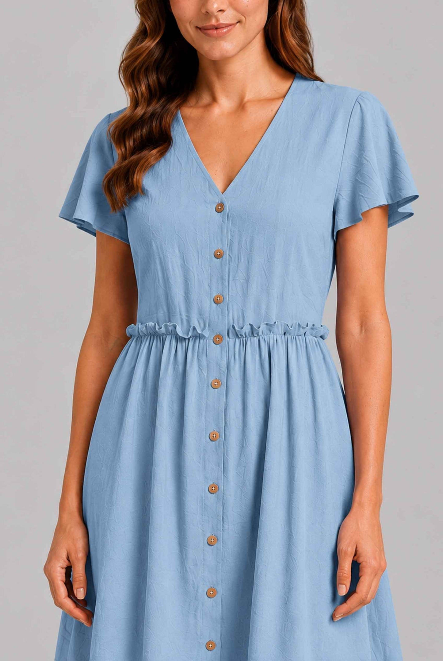 Virtual Model wearing The Delia Buttoned Mini Blue Flutter Sleeve Ruffled Dress