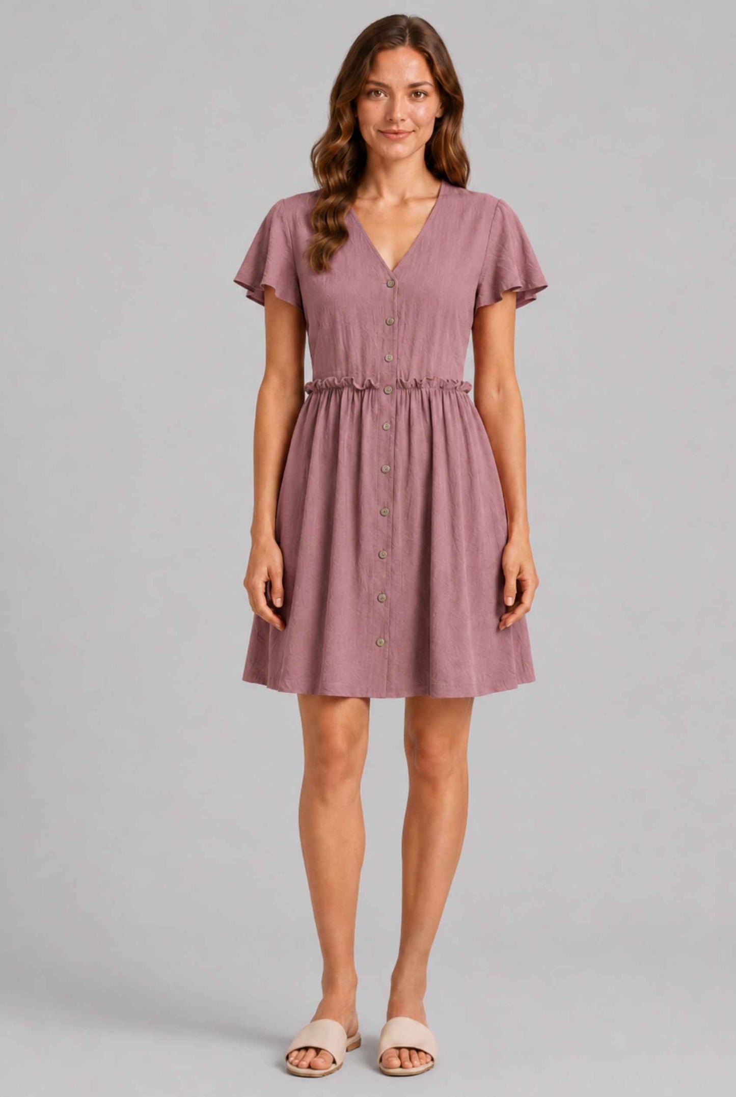Virtual Model wearing The Delia Buttoned Mini Blush Flutter Sleeve Ruffled Dress