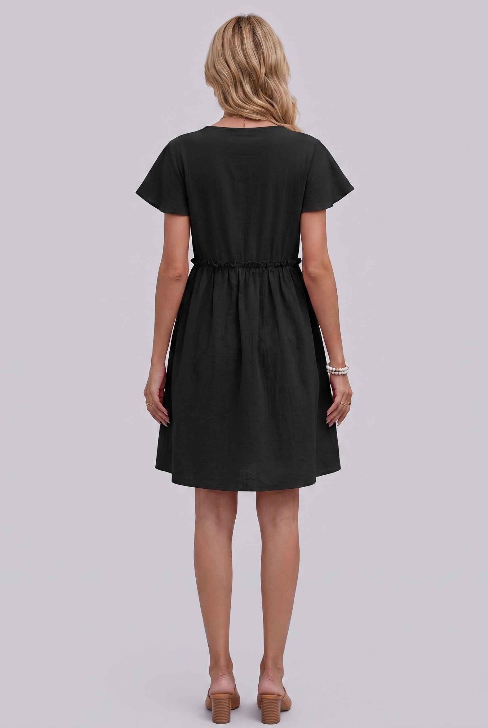 Virtual Model Wearing The Delia Buttoned Mini Flutter Sleeve Ruffled Black Dress