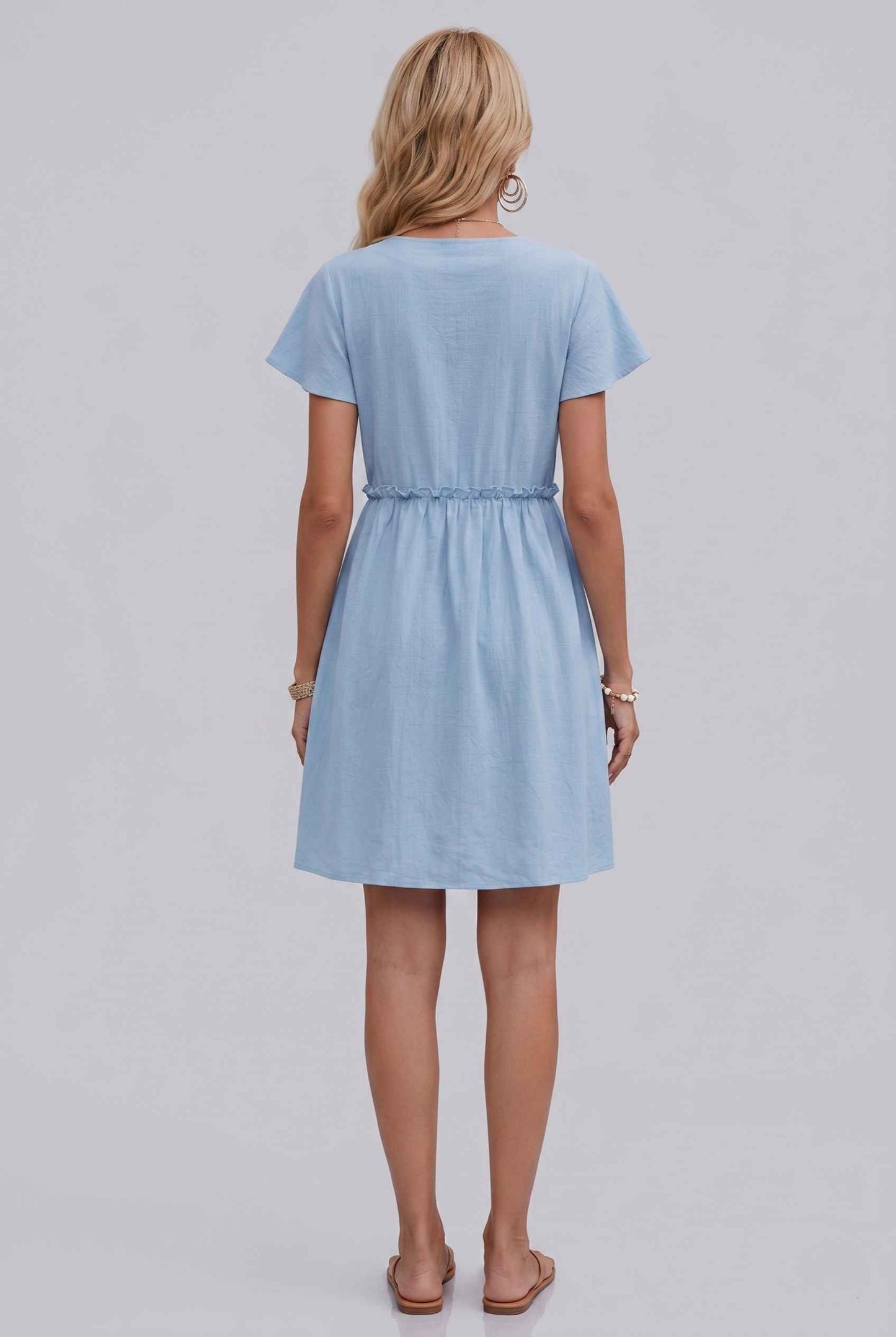 Virtual Model Wearing The Delia Buttoned Mini Flutter Sleeve Ruffled Blue Dress