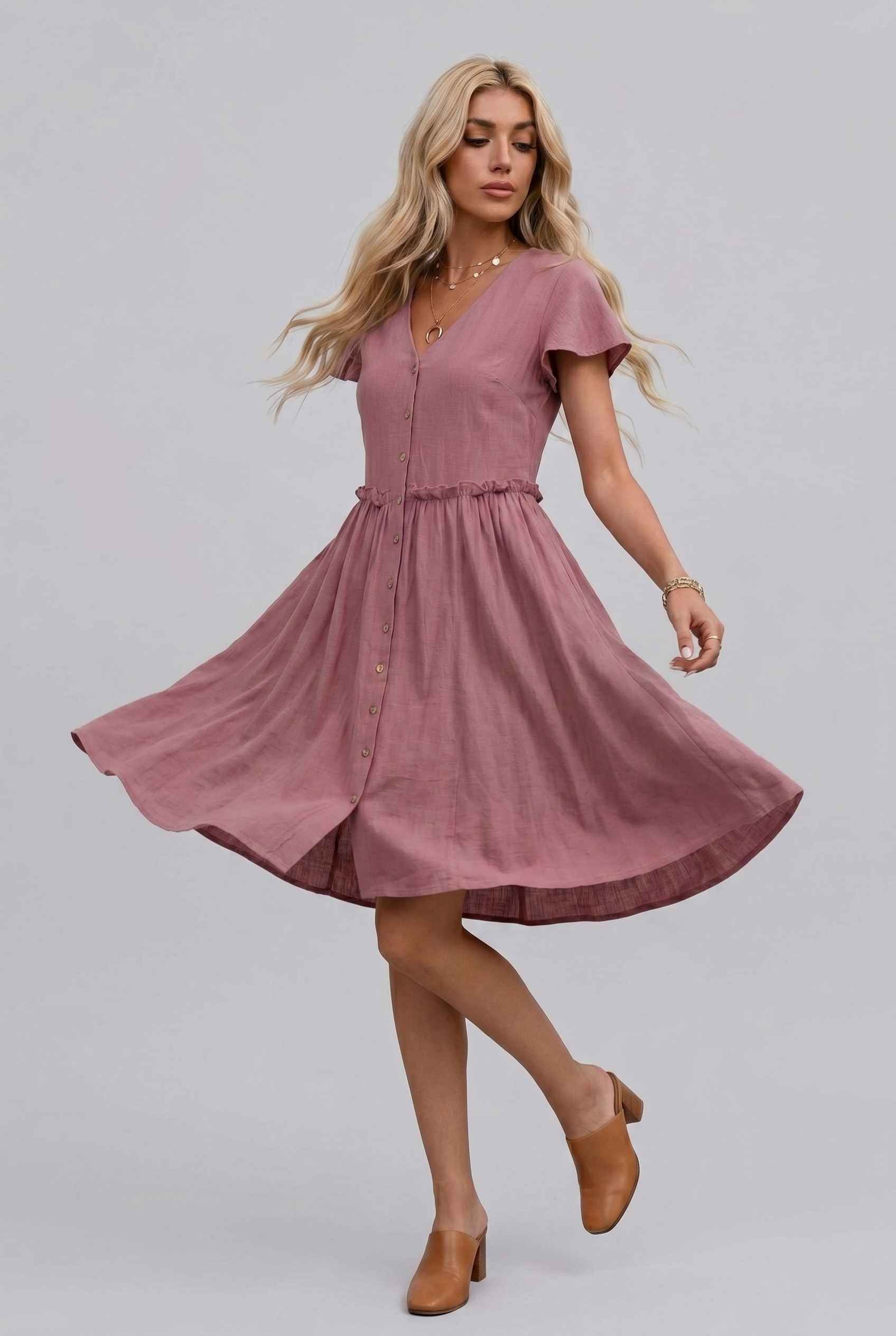 Virtual Model Wearing The Delia Buttoned Mini Flutter Sleeve Ruffled Blush Dress