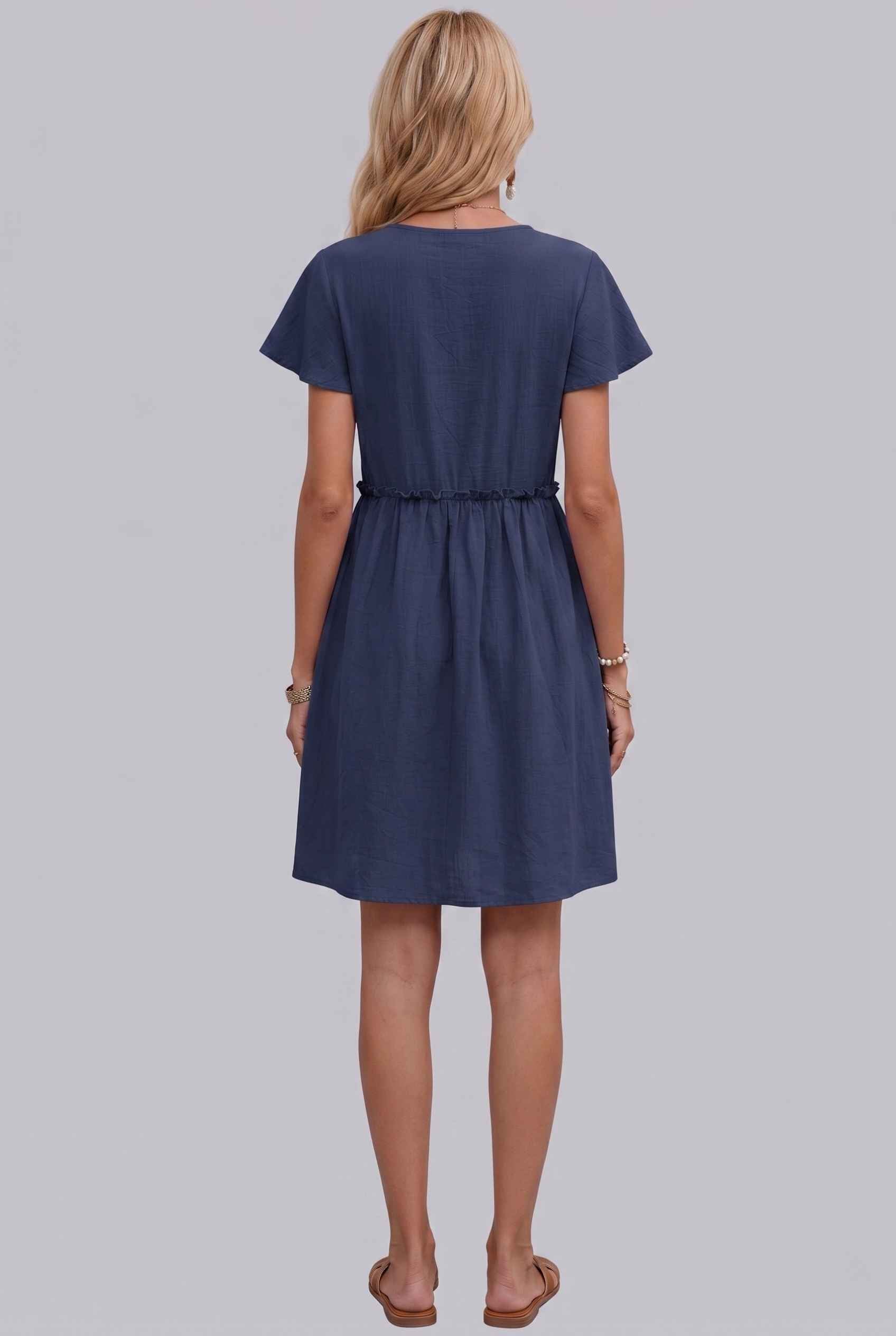 Virtual Model Wearing The Delia Buttoned Mini Flutter Sleeve Ruffled Navy Dress