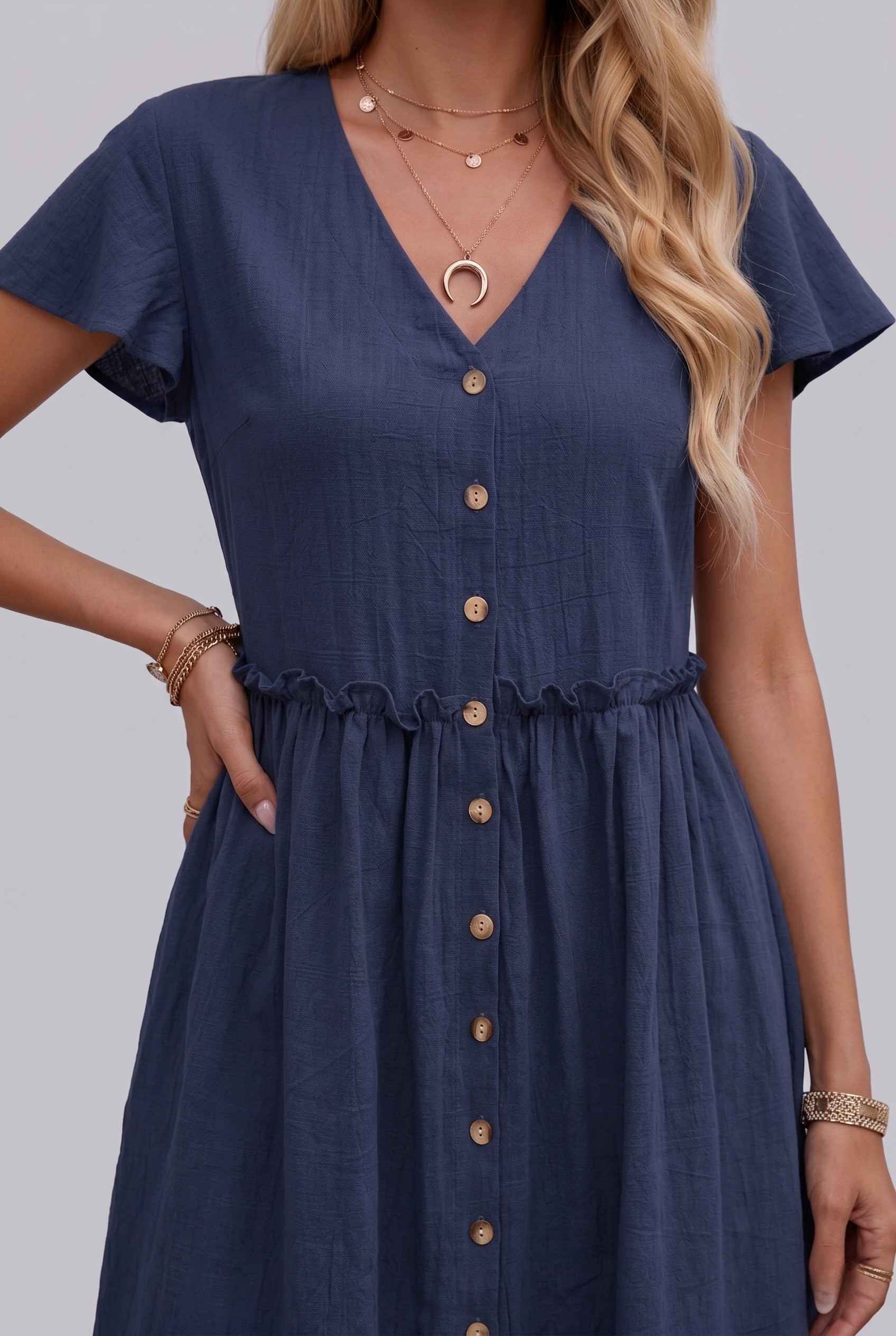 Virtual Model Wearing The Delia Buttoned Mini Flutter Sleeve Ruffled Navy Dress