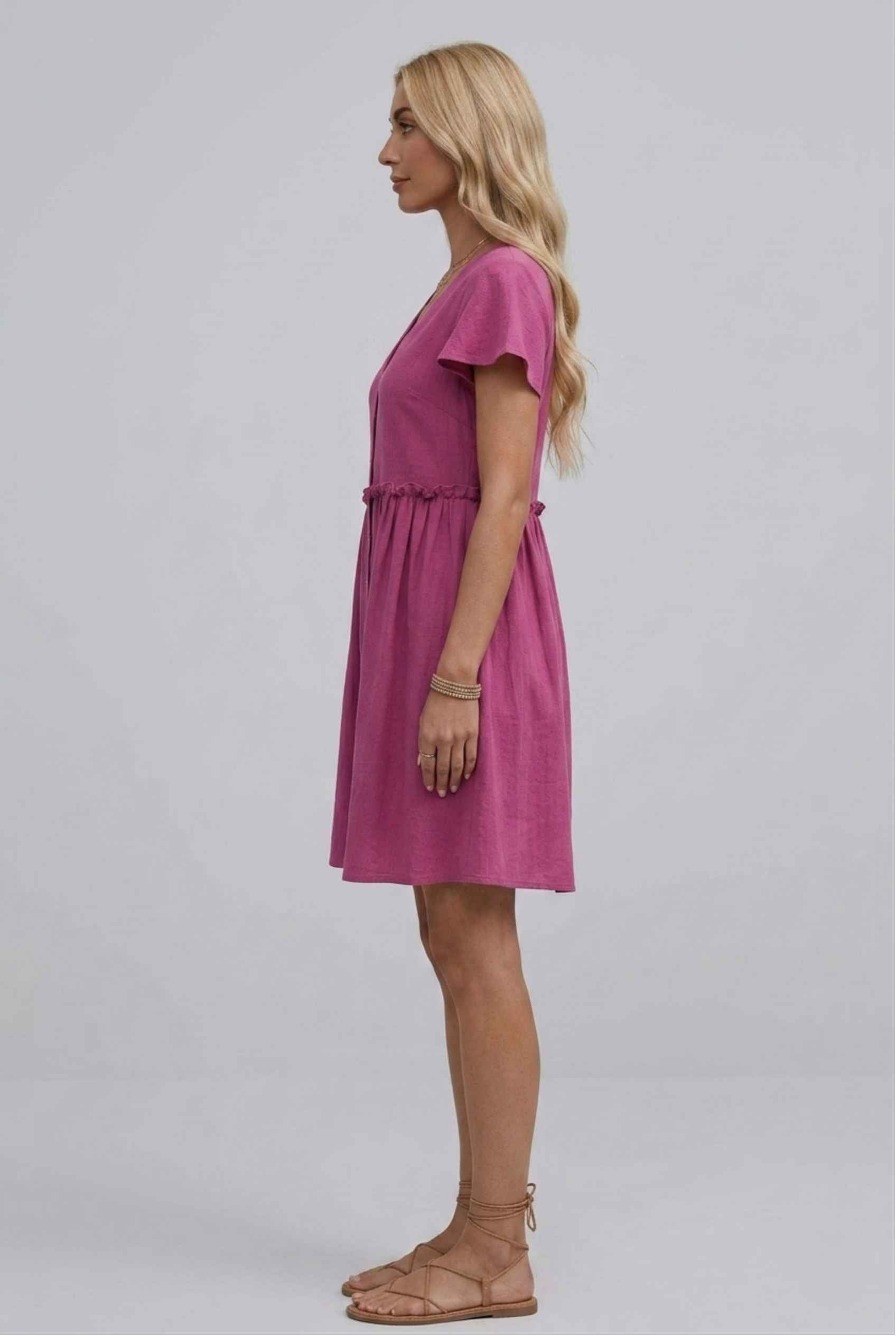 Virtual Model Wearing The Delia Buttoned Mini Flutter Sleeve Ruffled Pink Dress