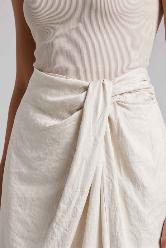 Virtual Model wearing The Elara Twist-Front Skirt Light Gray Textured Gathered Midi Skirt