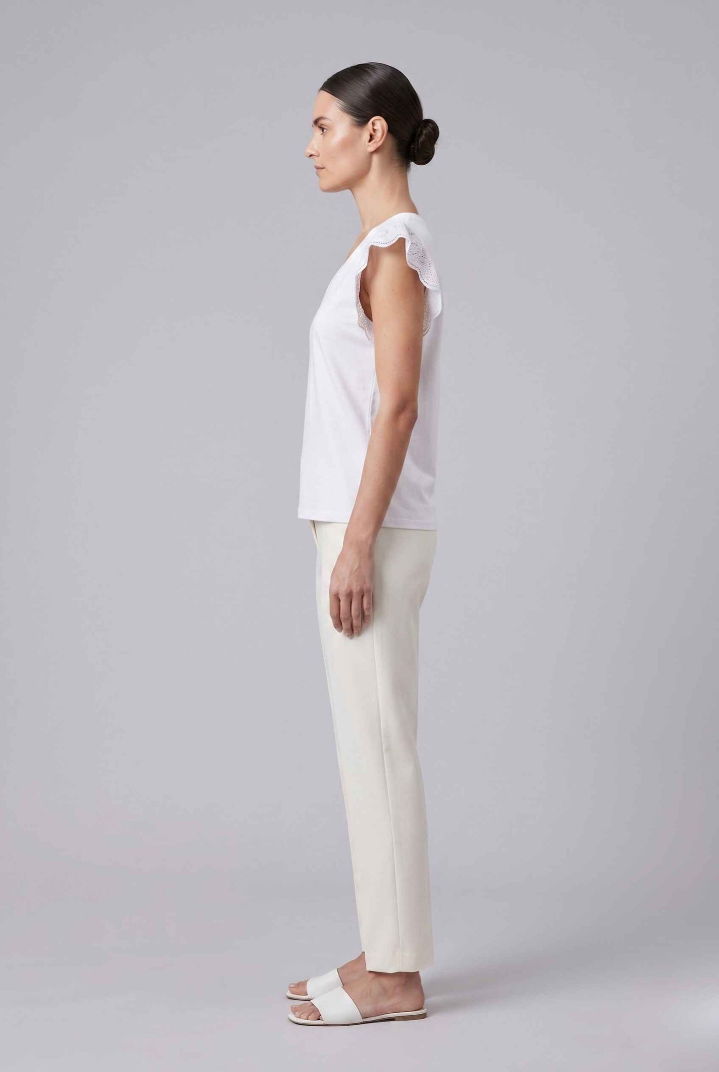 Virtual Model wearing The Emilia Eyelet Top Ruffled Cap Sleeve White V-Neck Top