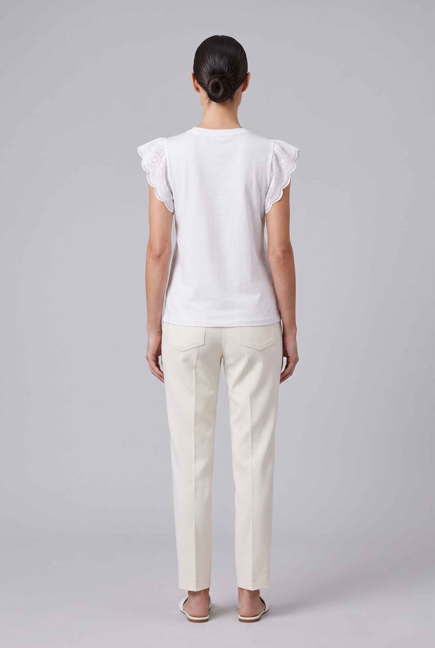 Virtual Model wearing The Emilia Eyelet Top Ruffled Cap Sleeve White V-Neck Top