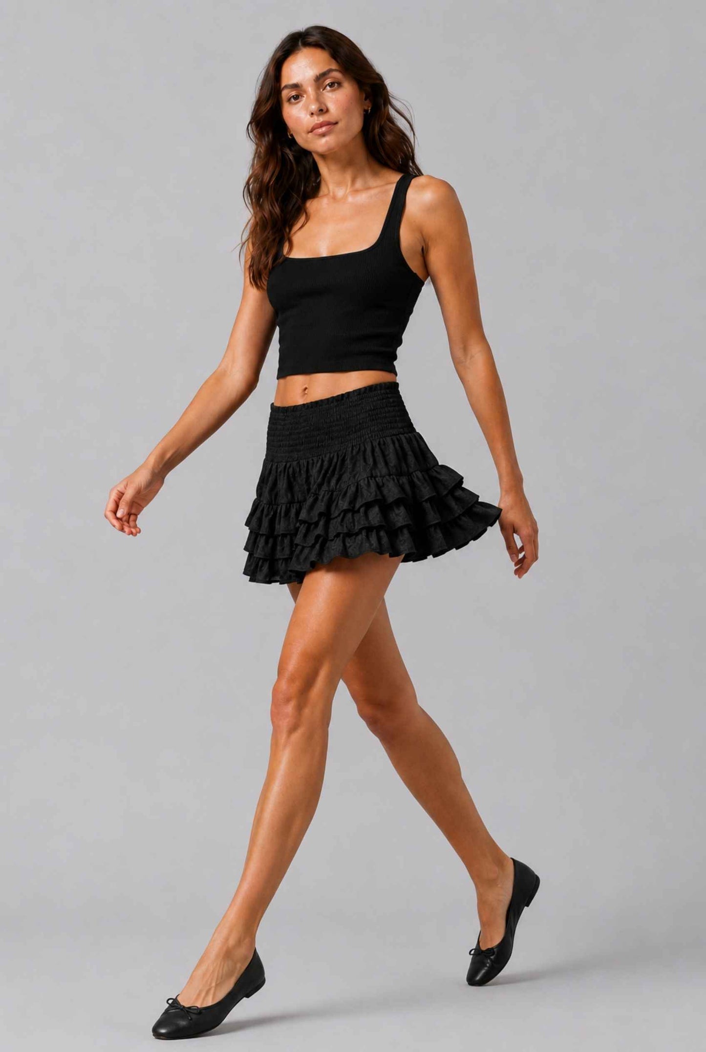 Virtual Model wearing The Etta Tiered Ruffle Mini Skirt Black Smocked Ruffle Layered Mini Skirt
