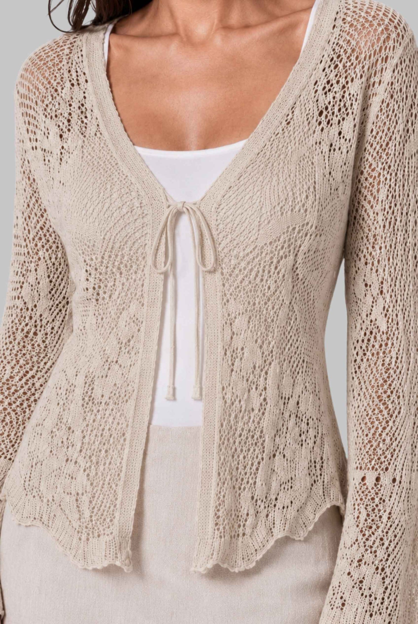 Virtual Model wearing The Faye Tie-Front Cardigan Open Stitch Crochet Cardigan in Beige