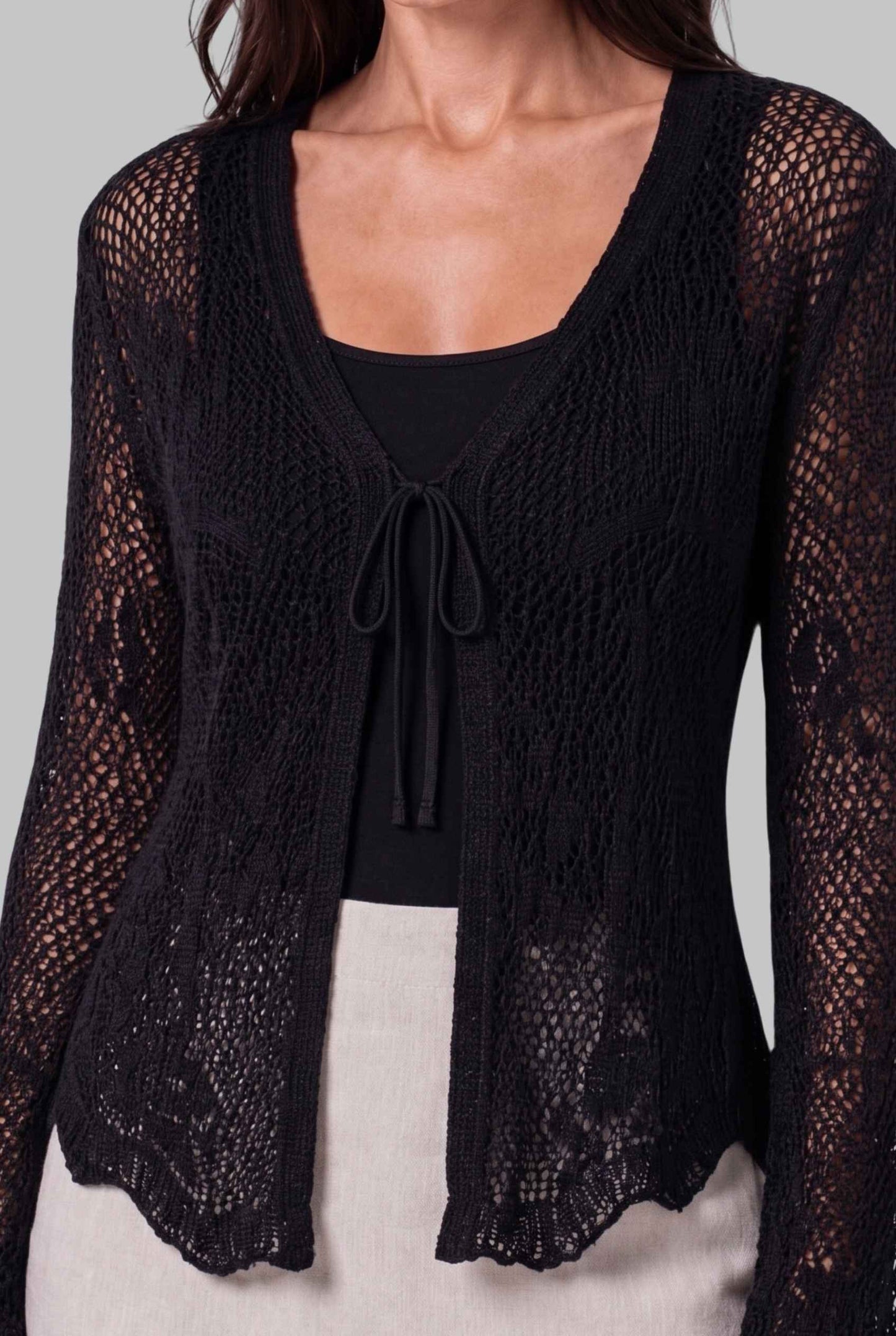 Virtual Model wearing The Faye Tie-Front Cardigan Open Stitch Crochet Cardigan in Black