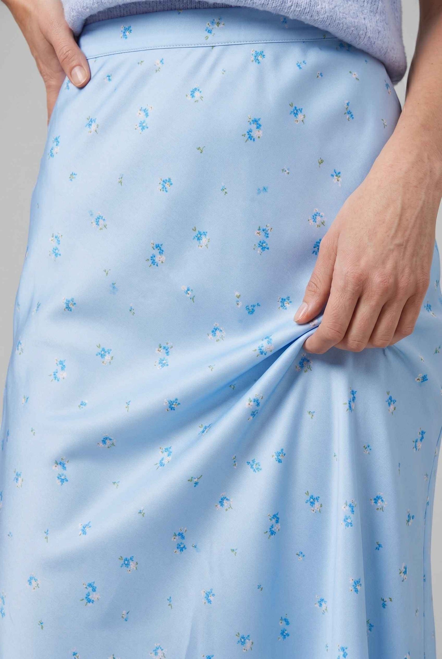 Virtual Model wearing The Florence Satin Skirt Floral Satin Bias Cut Blue Maxi Skirt
