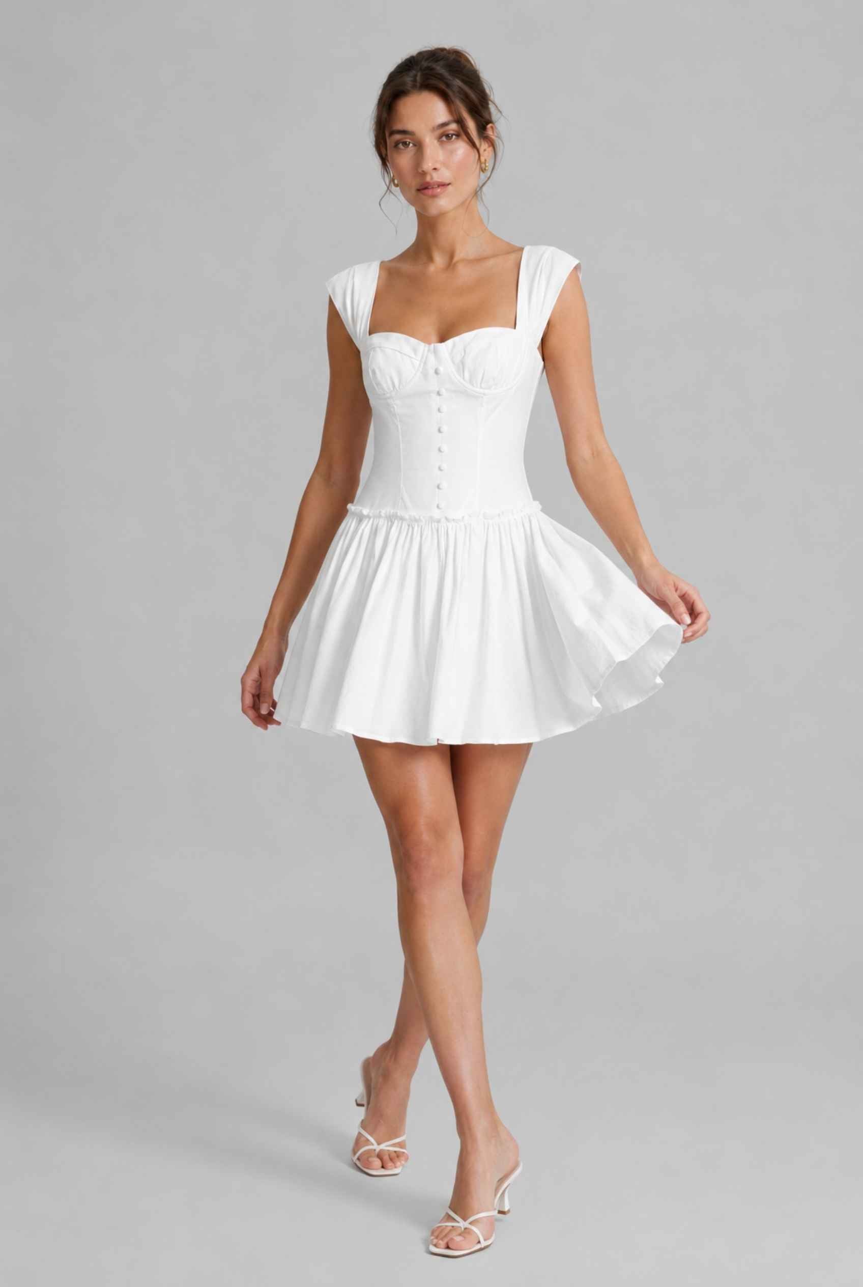 The Iris Poplin Mini Bustier Top White Poplin Dress on a gray background