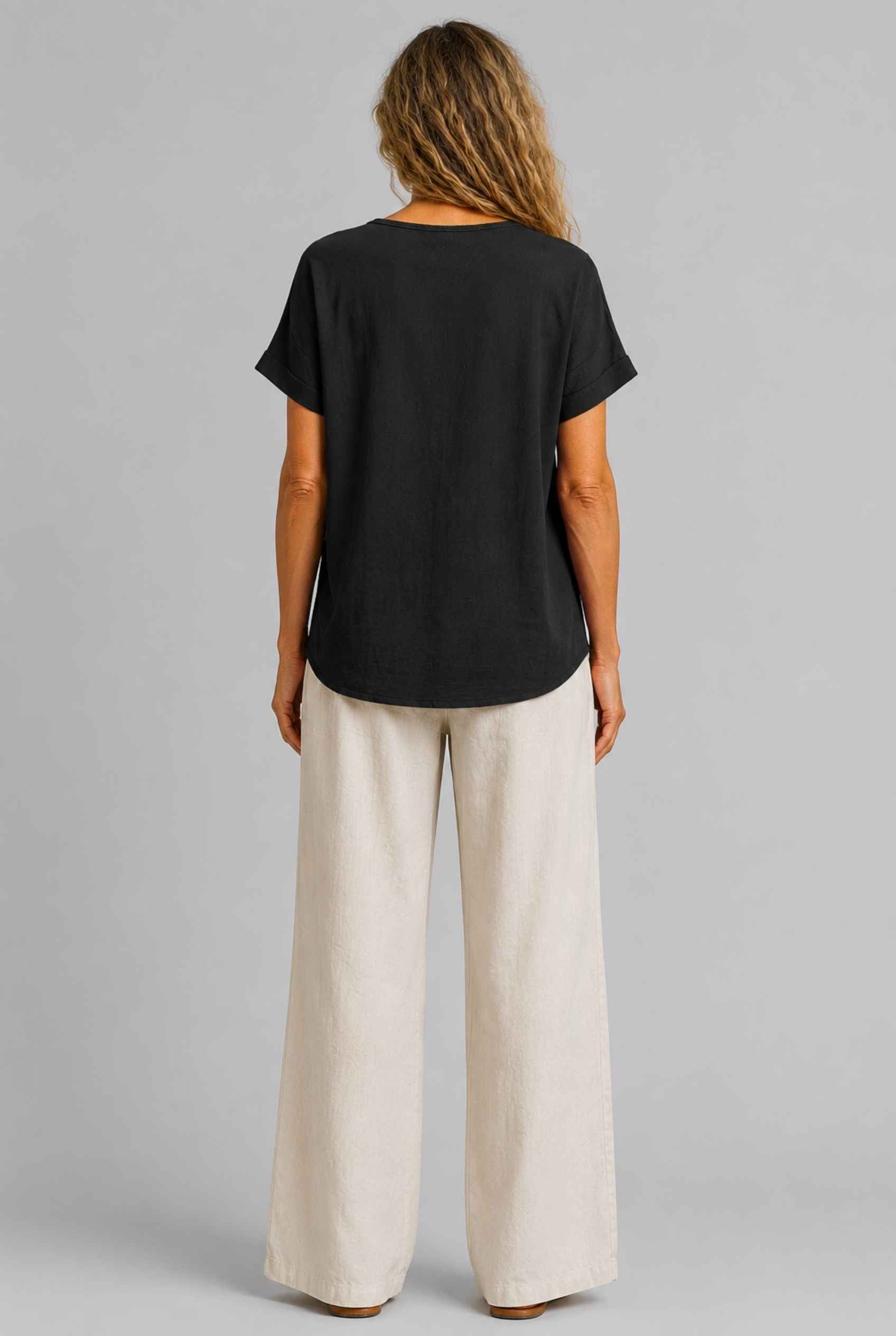Virtual Model Wearing The Kira Cotton-Linen Top Relaxed Scoop Neck Short Sleeve Black Top