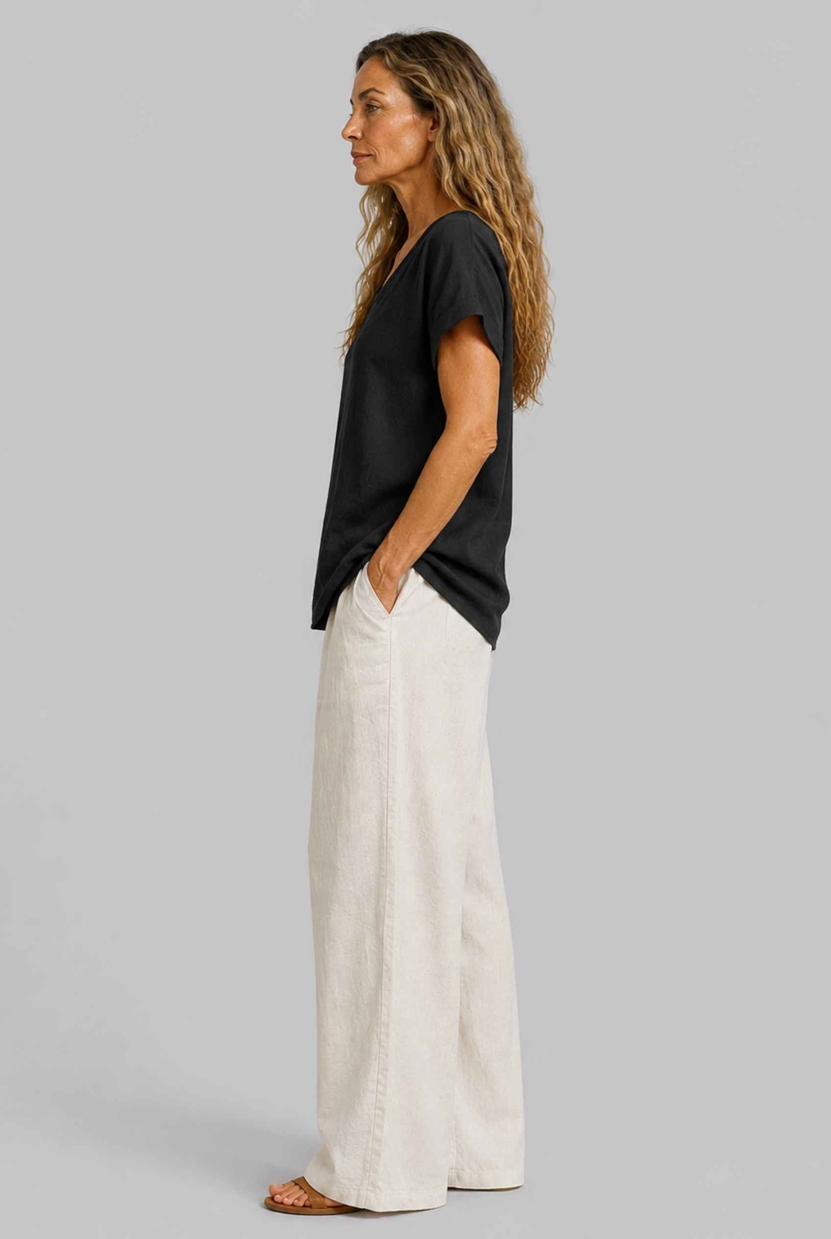 Virtual Model Wearing The Kira Cotton-Linen Top Relaxed Scoop Neck Short Sleeve Black Top