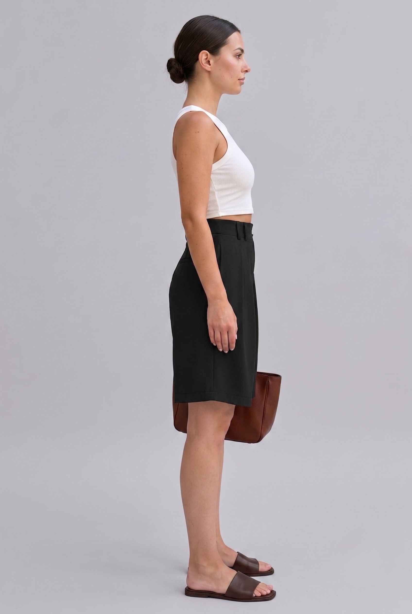 Virtual Model wearing The Kyoto Pleated Short Pleated High Waisted Black Asymmetrical Short