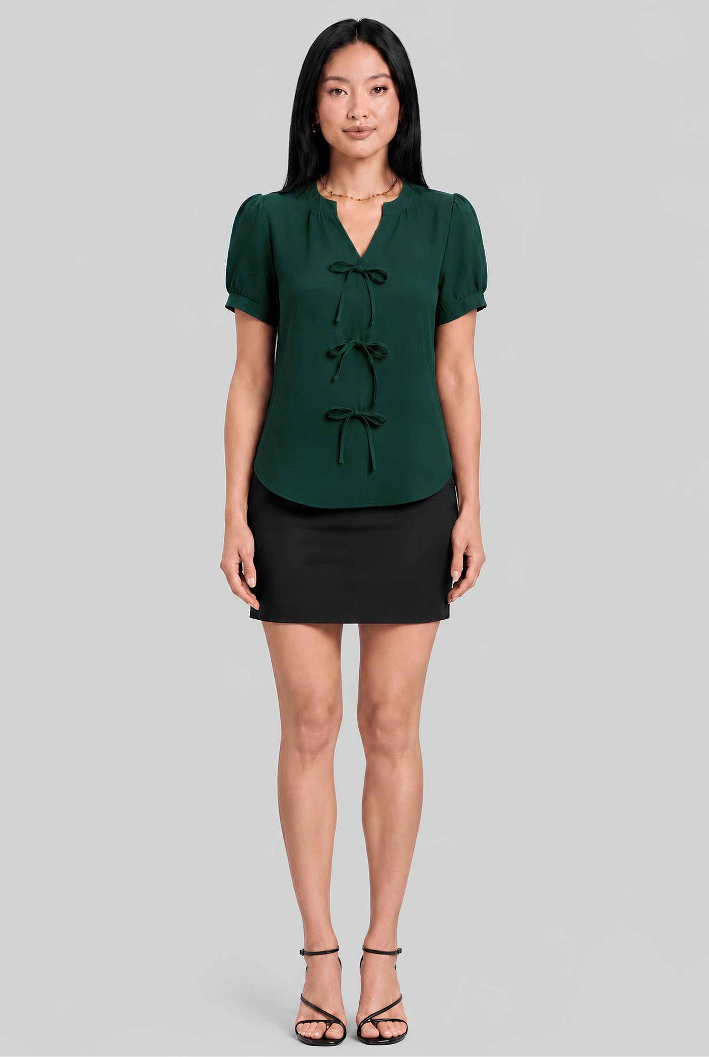 Virtual model wearing The Lillian Bow Blouse Puff Sleeve Bow Triple Detail Crepe Blouse in Green