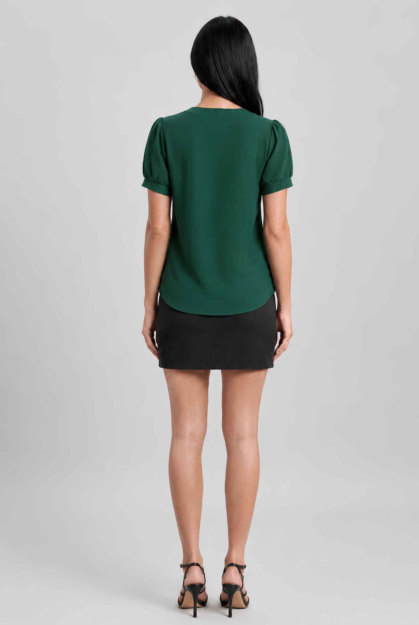 Virtual model wearing The Lillian Bow Blouse Puff Sleeve Bow Triple Detail Crepe Blouse in Green
