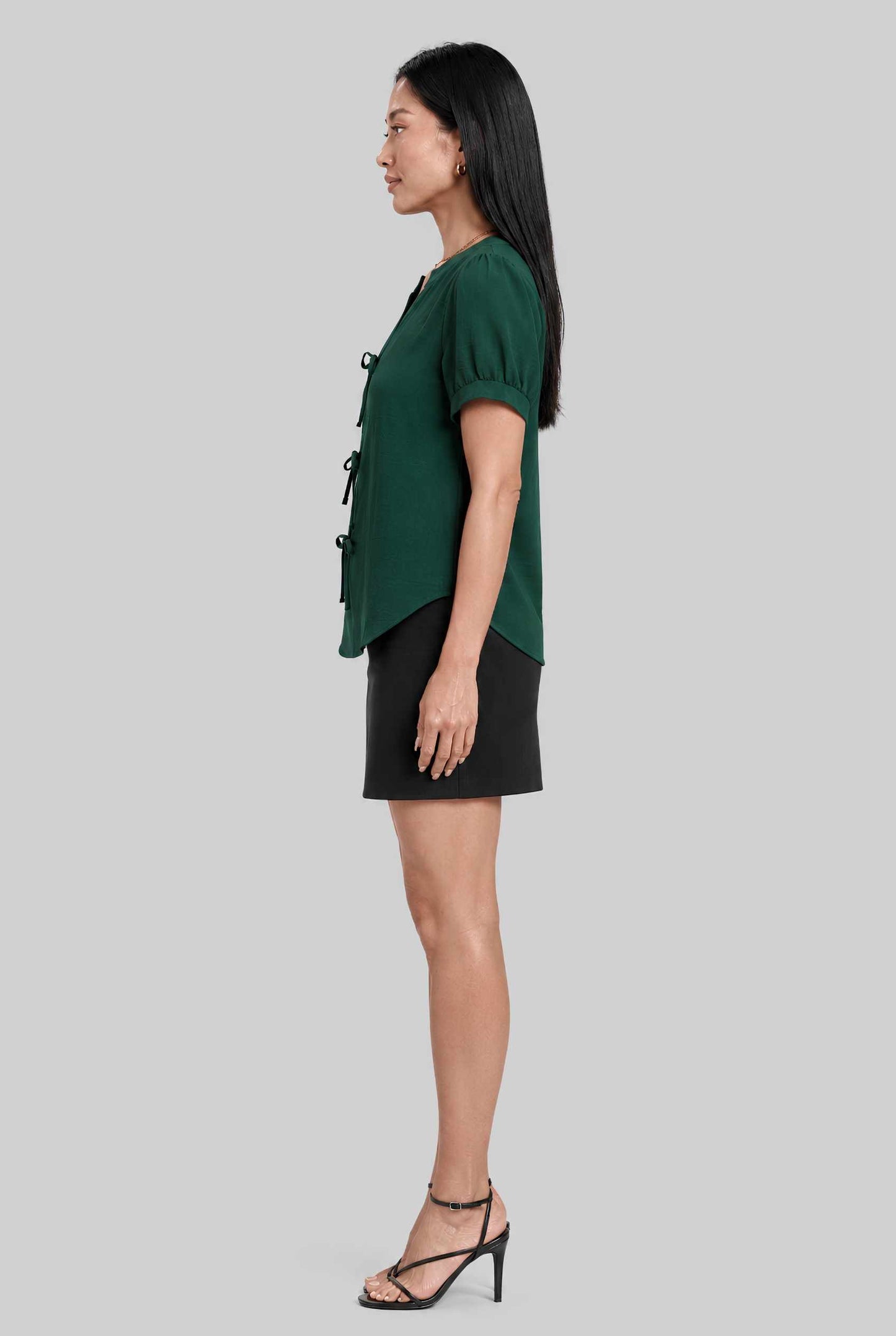 Virtual model wearing The Lillian Bow Blouse Puff Sleeve Bow Triple Detail Crepe Blouse in Green