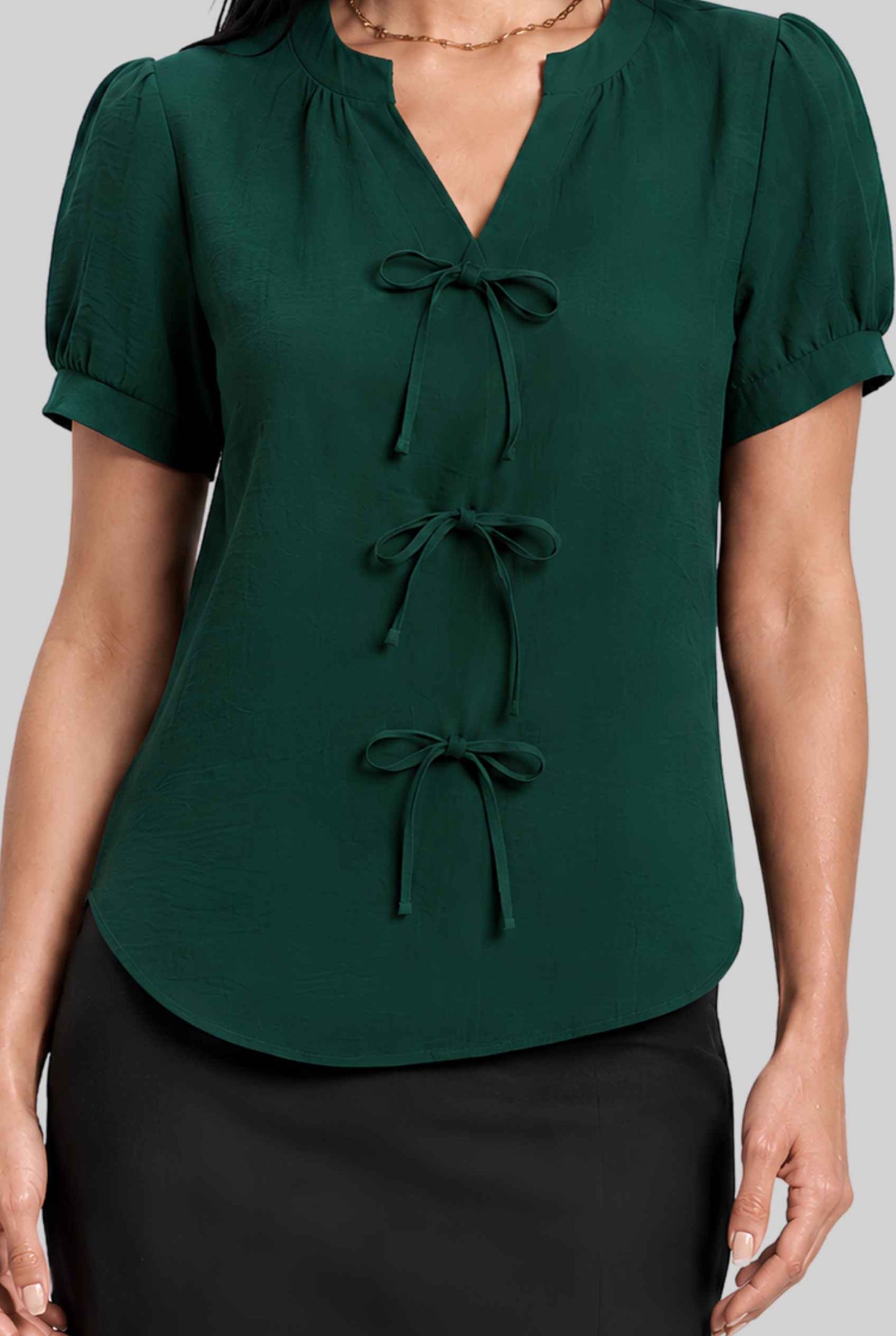 Virtual model wearing The Lillian Bow Blouse Puff Sleeve Bow Triple Detail Crepe Blouse in Green