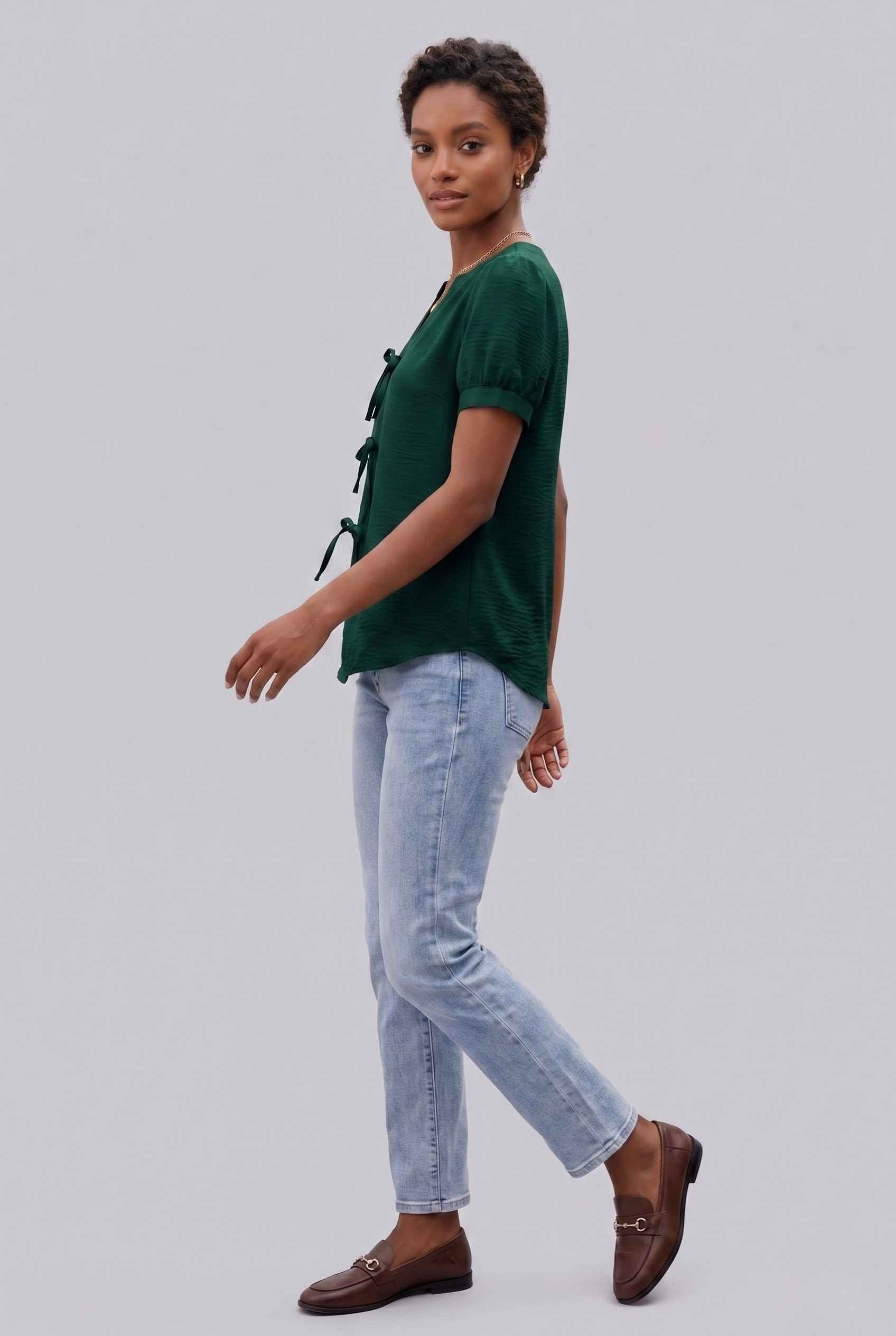 Virtual Model wearing The Lillian Bow Blouse Puff Sleeve Green Crepe Top