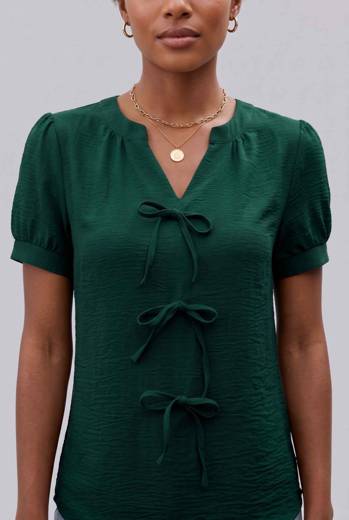 Virtual Model wearing The Lillian Bow Blouse Puff Sleeve Green Crepe Top
