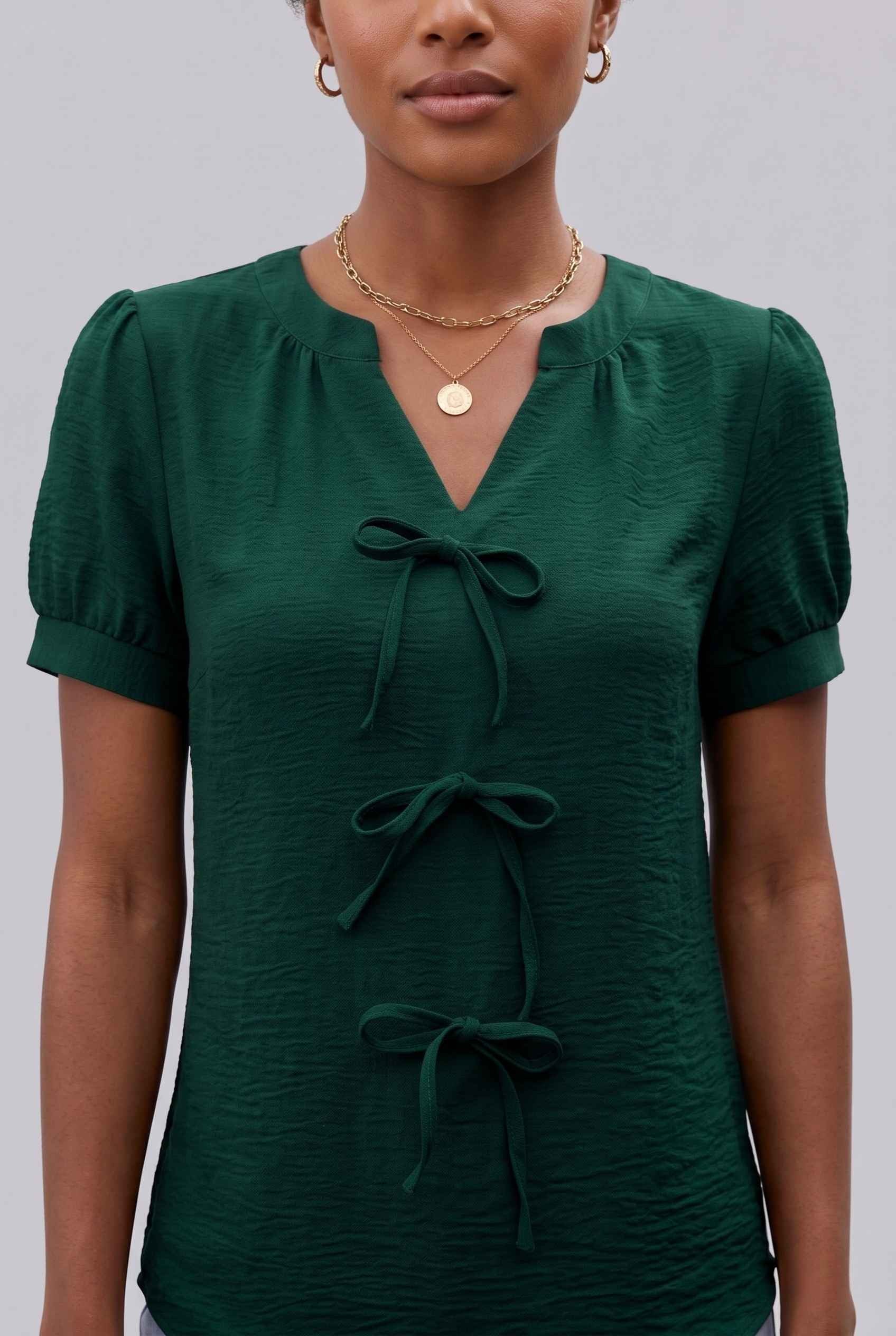 Virtual Model wearing The Lillian Bow Blouse Puff Sleeve Green Crepe Top
