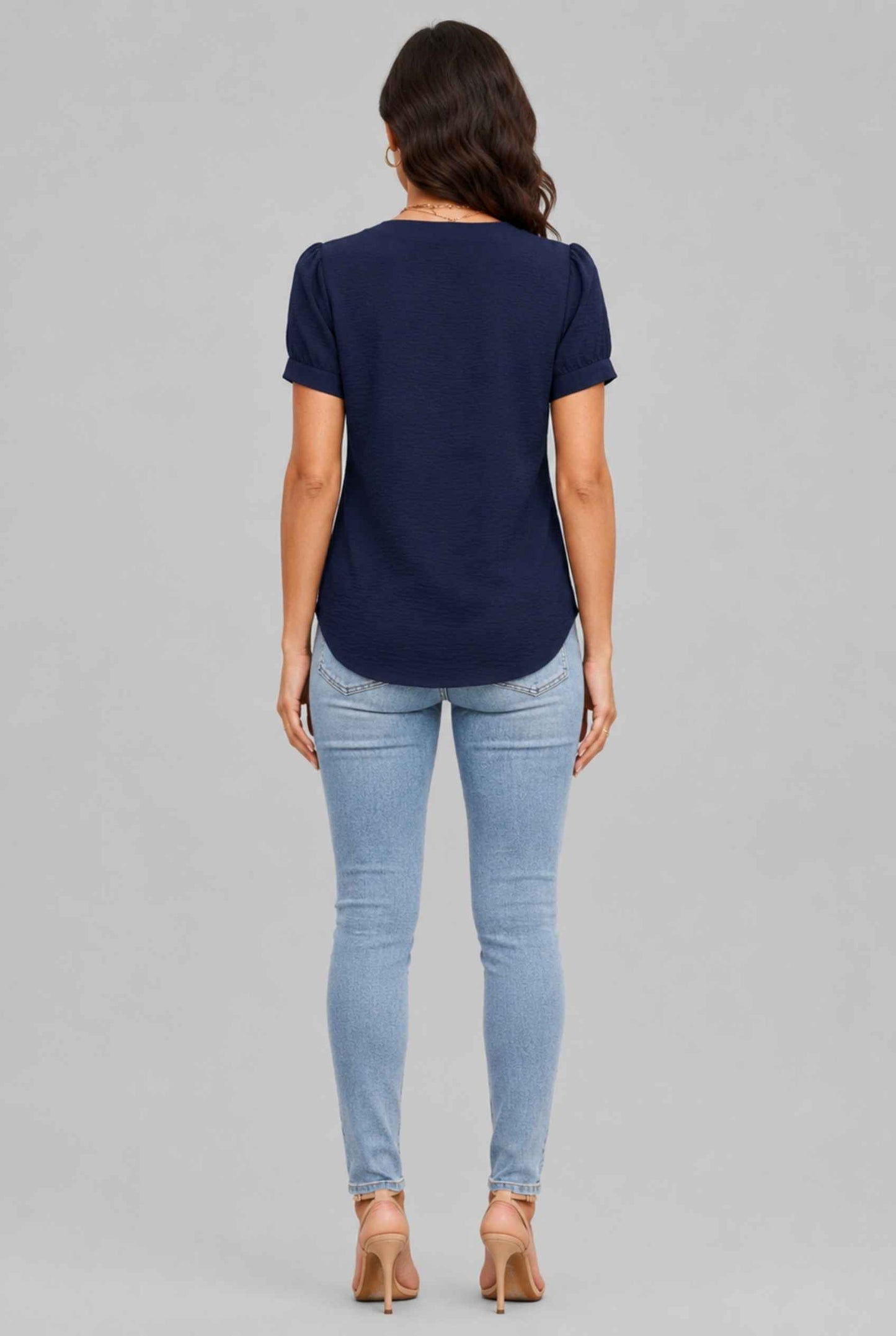 Virtual Model wearing The Lillian Bow Blouse Puff Sleeve Navy Crepe Top
