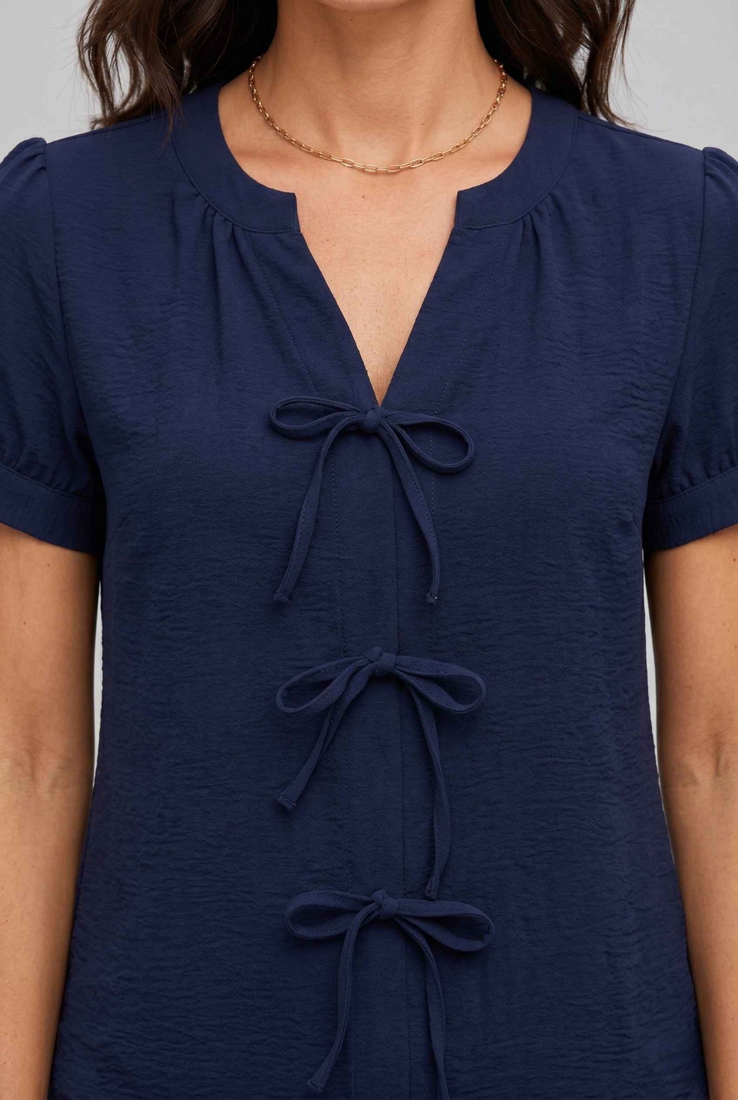 Virtual Model wearing The Lillian Bow Blouse Puff Sleeve Navy Crepe Top
