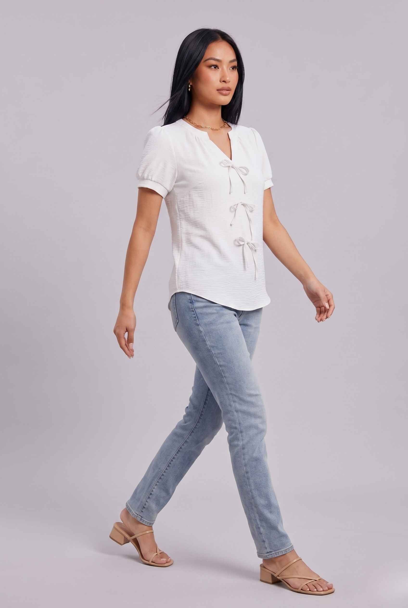 Virtual Model wearing The Lillian Bow Blouse Puff Sleeve Off White Crepe Top