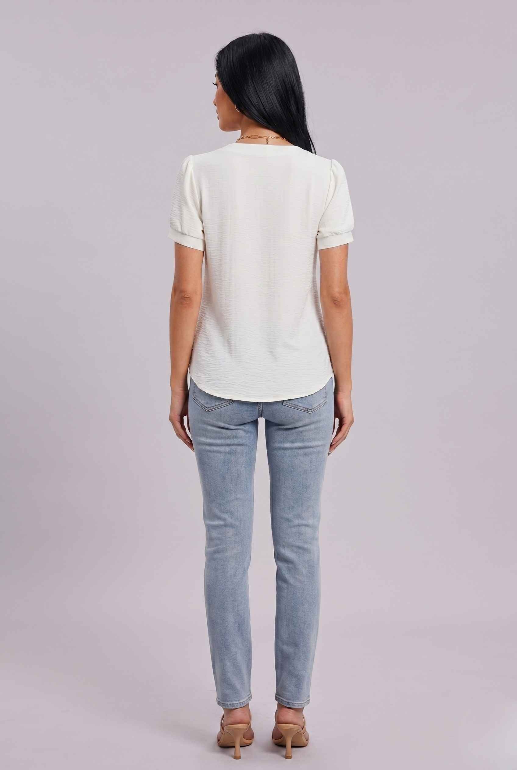 Virtual Model wearing The Lillian Bow Blouse Puff Sleeve Off White Crepe Top