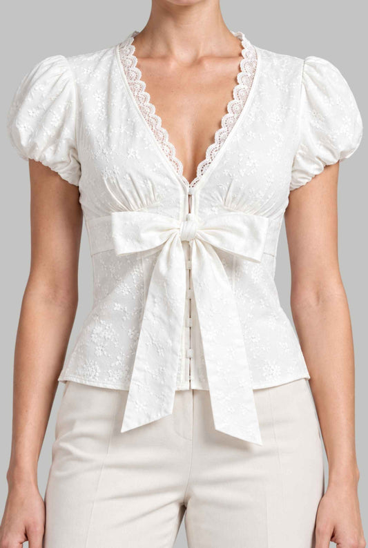 Virtual model wearing The Mabel Tie-Front Blouse White  V-Neck Embroidered Puff Sleeve Blouse