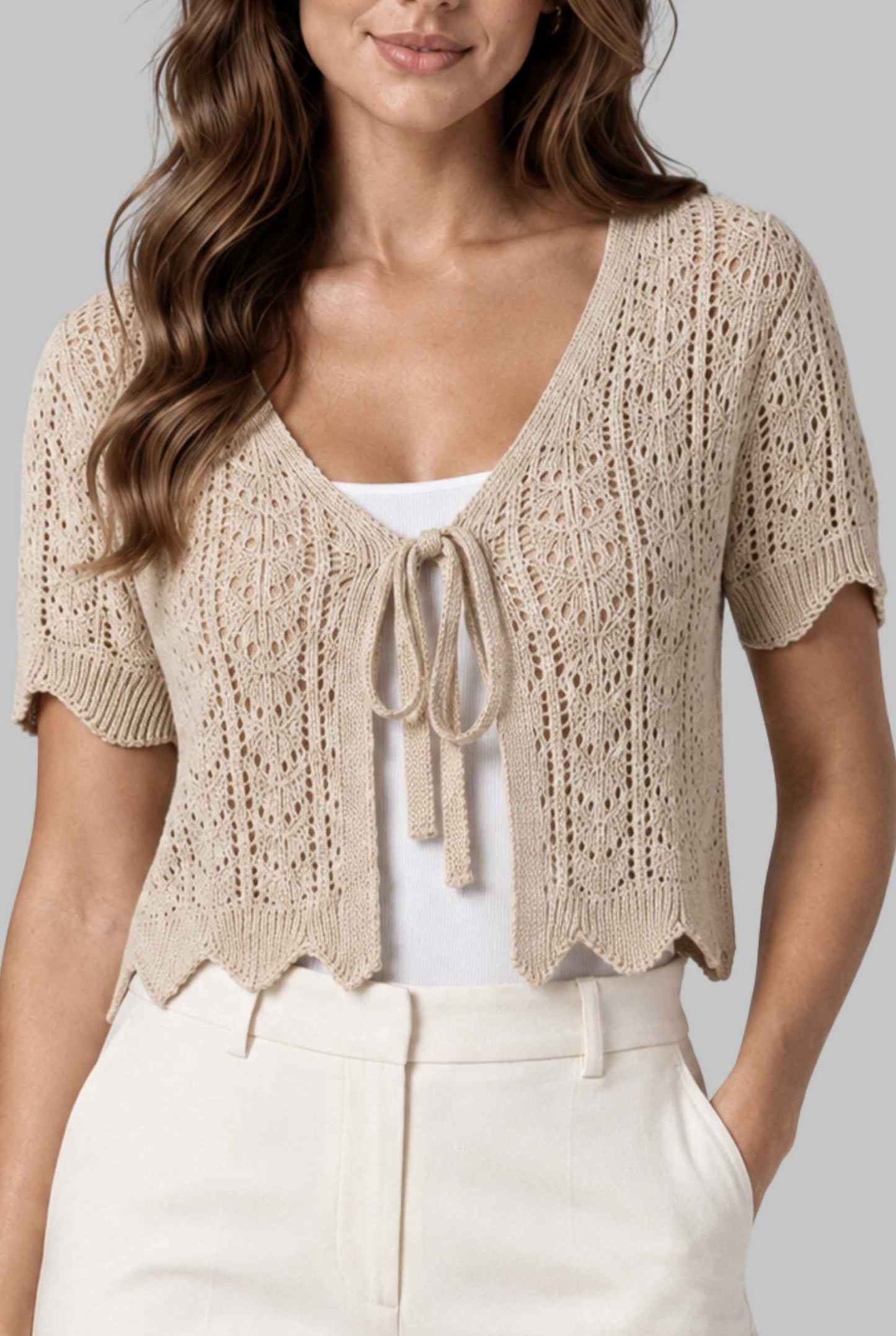 Virtual model wearing The Maisie Tie-Front Cardigan Cropped Light Knit Pointelle Cardigan in Beige