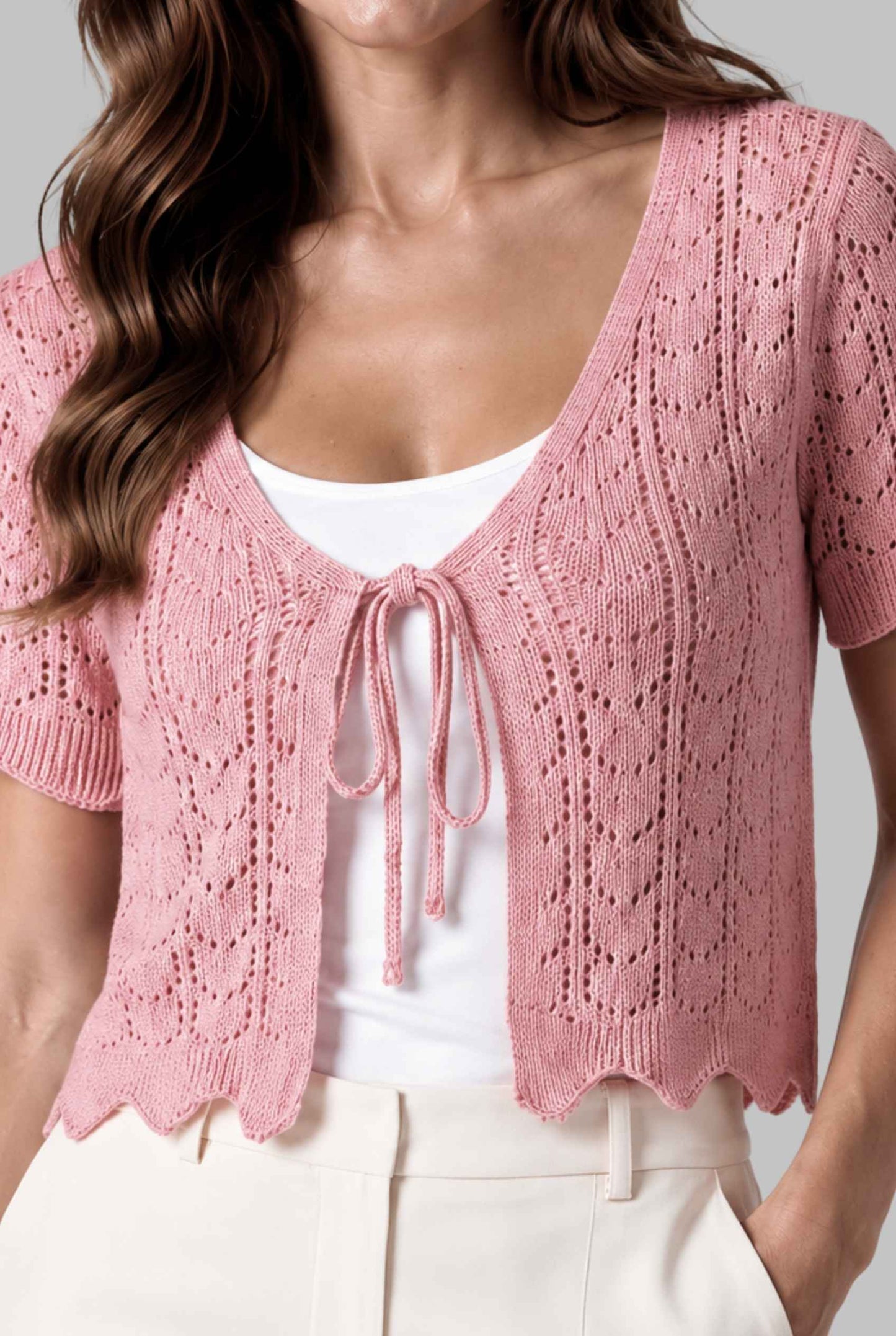 Virtual model wearing The Maisie Tie-Front Cardigan Cropped Light Knit Pointelle Cardigan in Pink