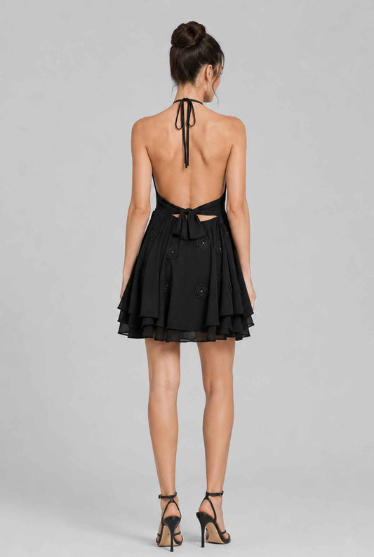 Virtual model wearing The Marbella Chiffon Halter Mini Dress Floral Appliqué Mini Dress in Black
