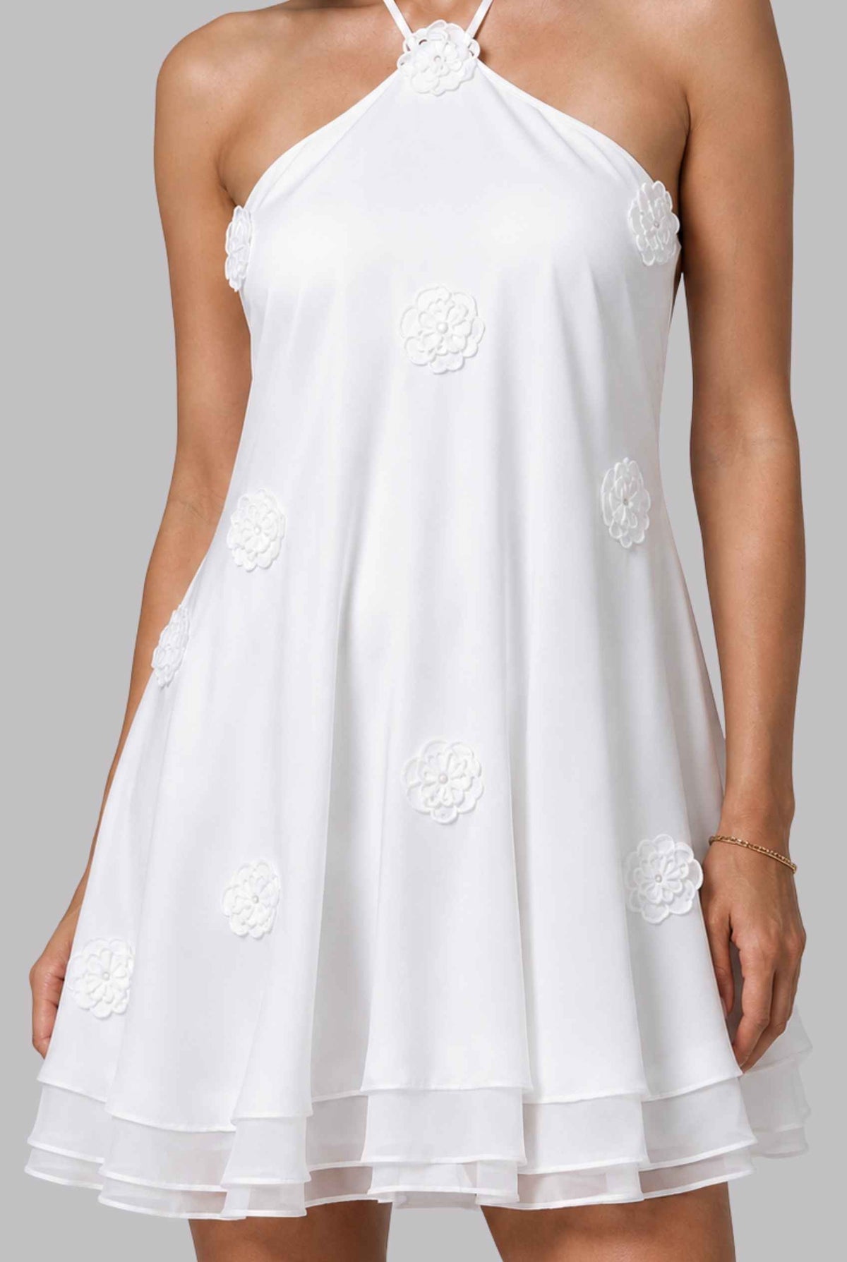Virtual model wearing The Marbella Chiffon Halter Mini Dress Floral Appliqué Mini Dress in White