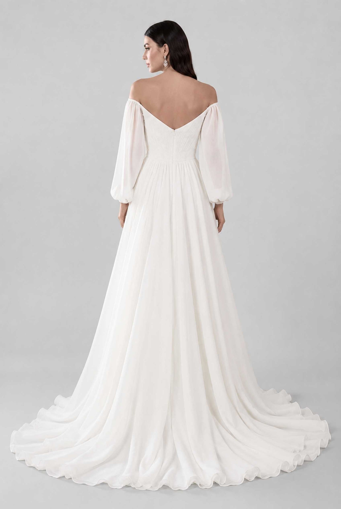 Virtual model wearing The Margaux Pleated Chiffon Dress Off-Shoulder Bishop-Sleeve Gown in White