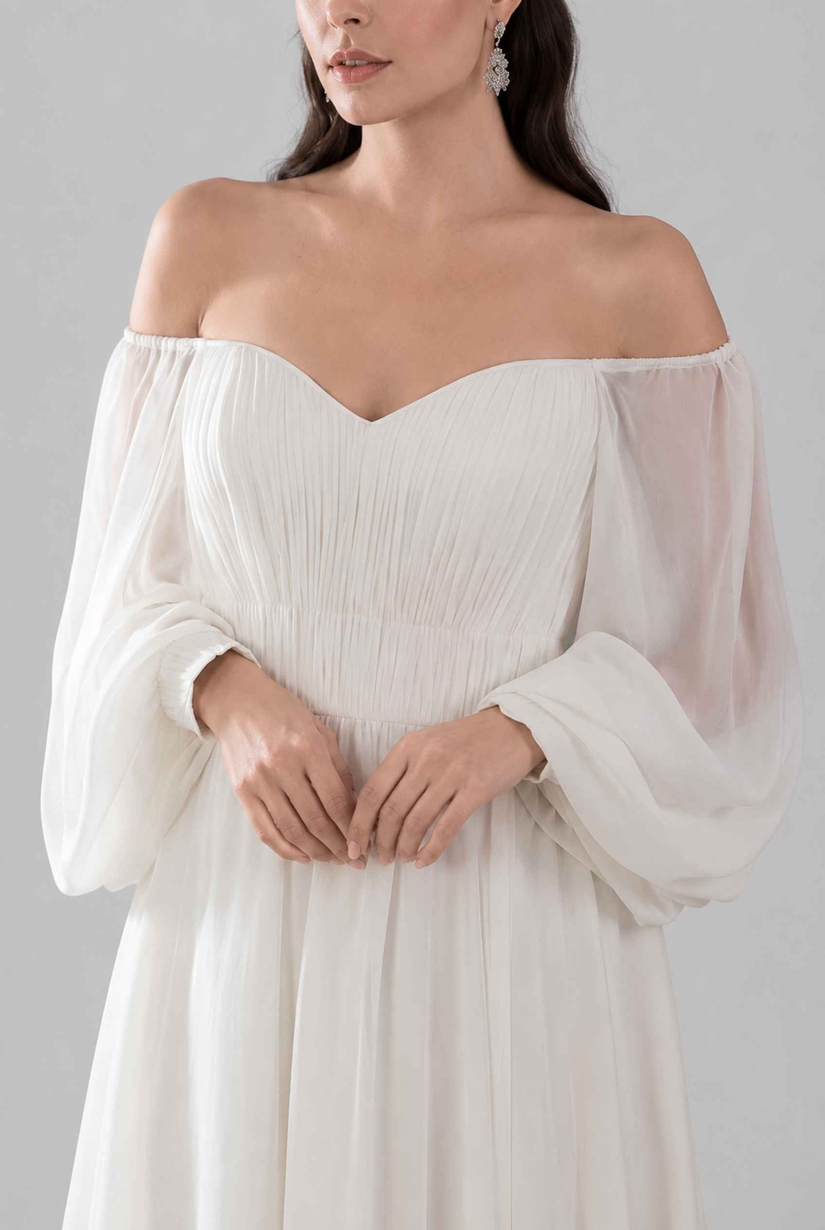 Virtual model wearing The Margaux Pleated Chiffon Dress Off-Shoulder Bishop-Sleeve Gown in White