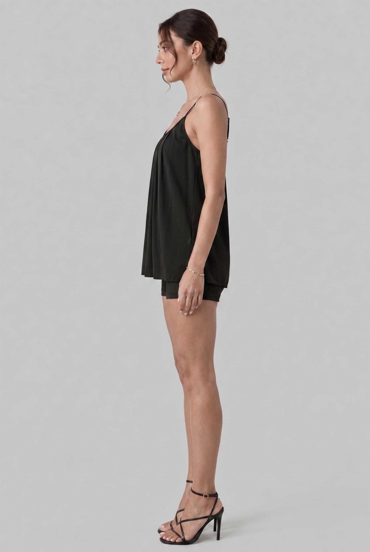 Virtual model wearing The Maya Swing Camisole Pleated Scoop Neck Swing Tank Top in Black